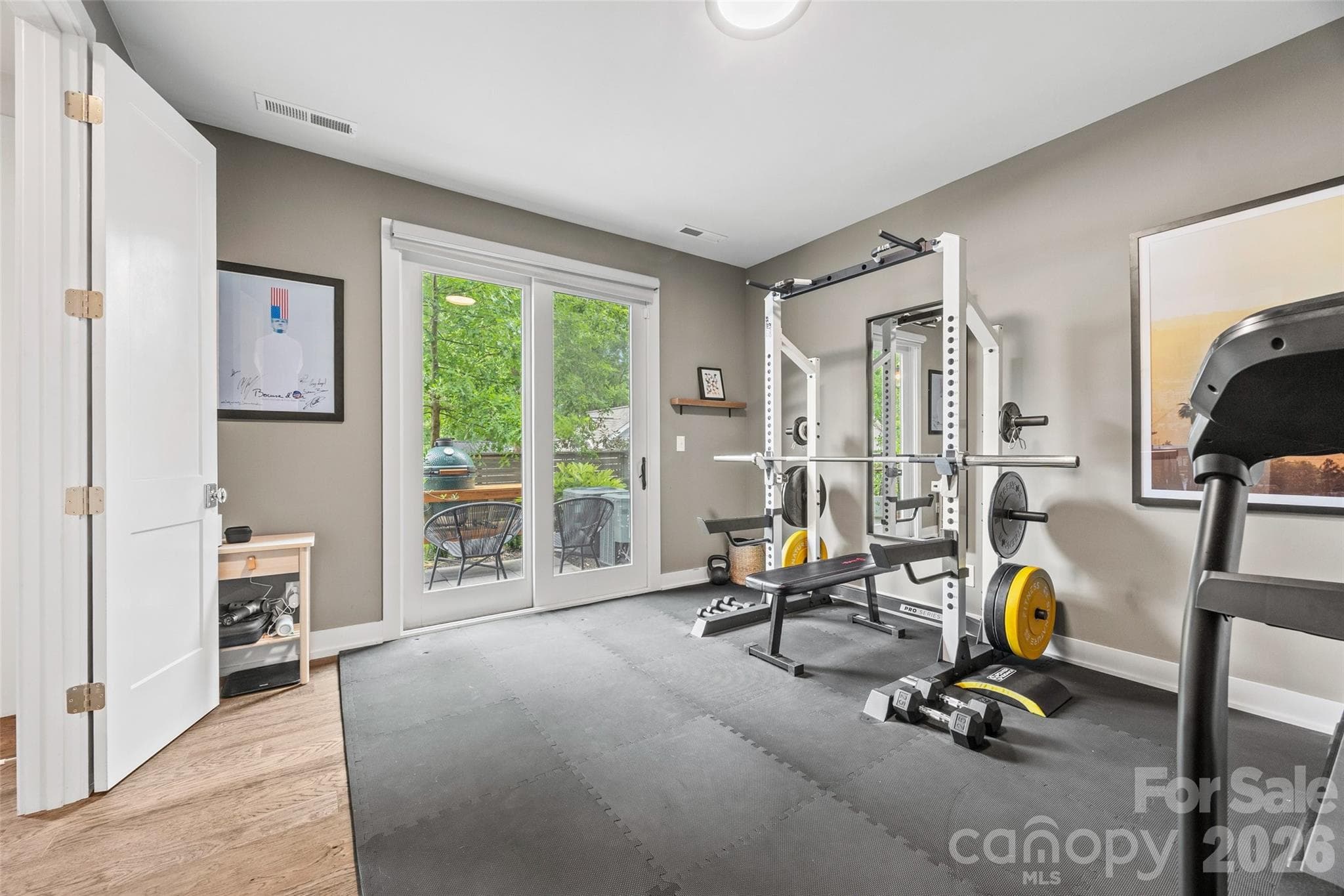 First-floor flex space ideal for a home office, gym or den - 4017 Plaza Row Court, Charlotte