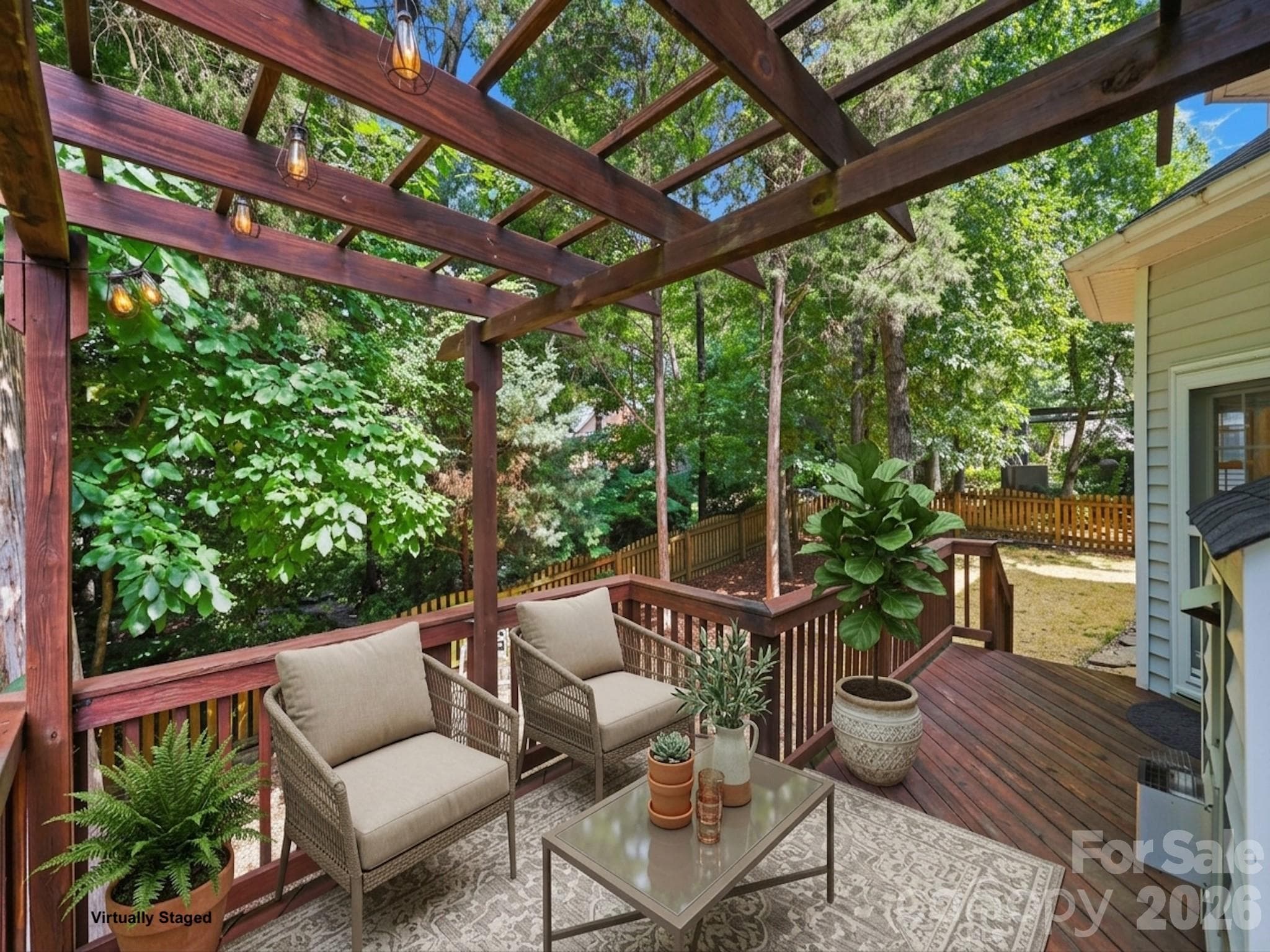 Spacious back deck with a pergola for entertaining! - 6832 Charter Hills Road, Charlotte