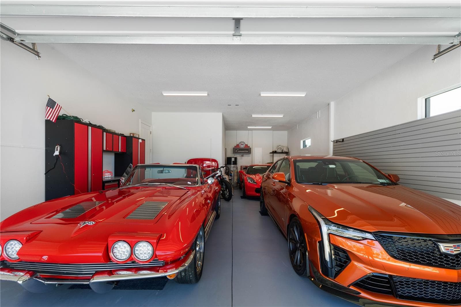 Bring your cars! Finished garage space designed for three cars with higher ceilings and electric for future lifts. - 23 OCEAN RIDGE BLVD N, PALM COAST