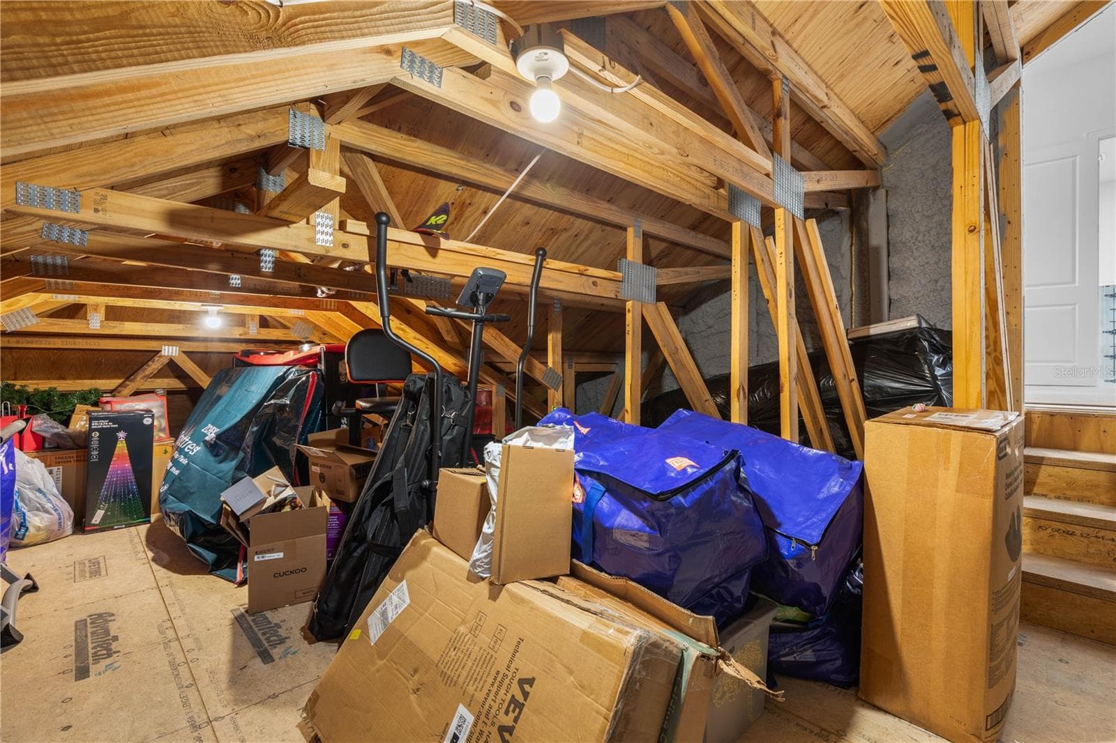 Convenient large walk-in attic storage space off second floor. - 23 OCEAN RIDGE BLVD N, PALM COAST