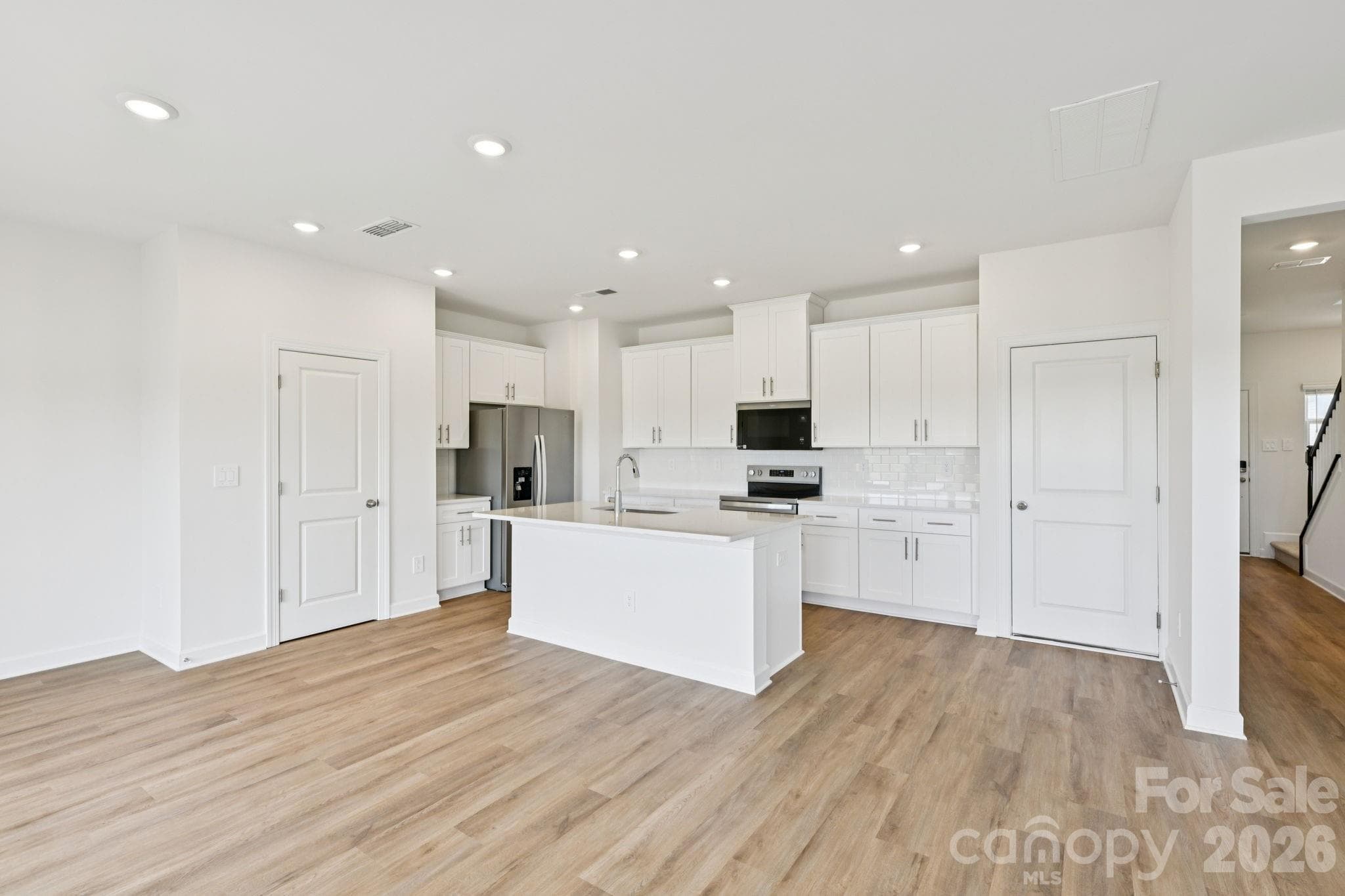 Photo is not of the actual home, but is an inspirational photo of builder’s model home and may depict options, furnishings, and/or decorator features that are not included - 5060 Poplin Valley, Cherryville