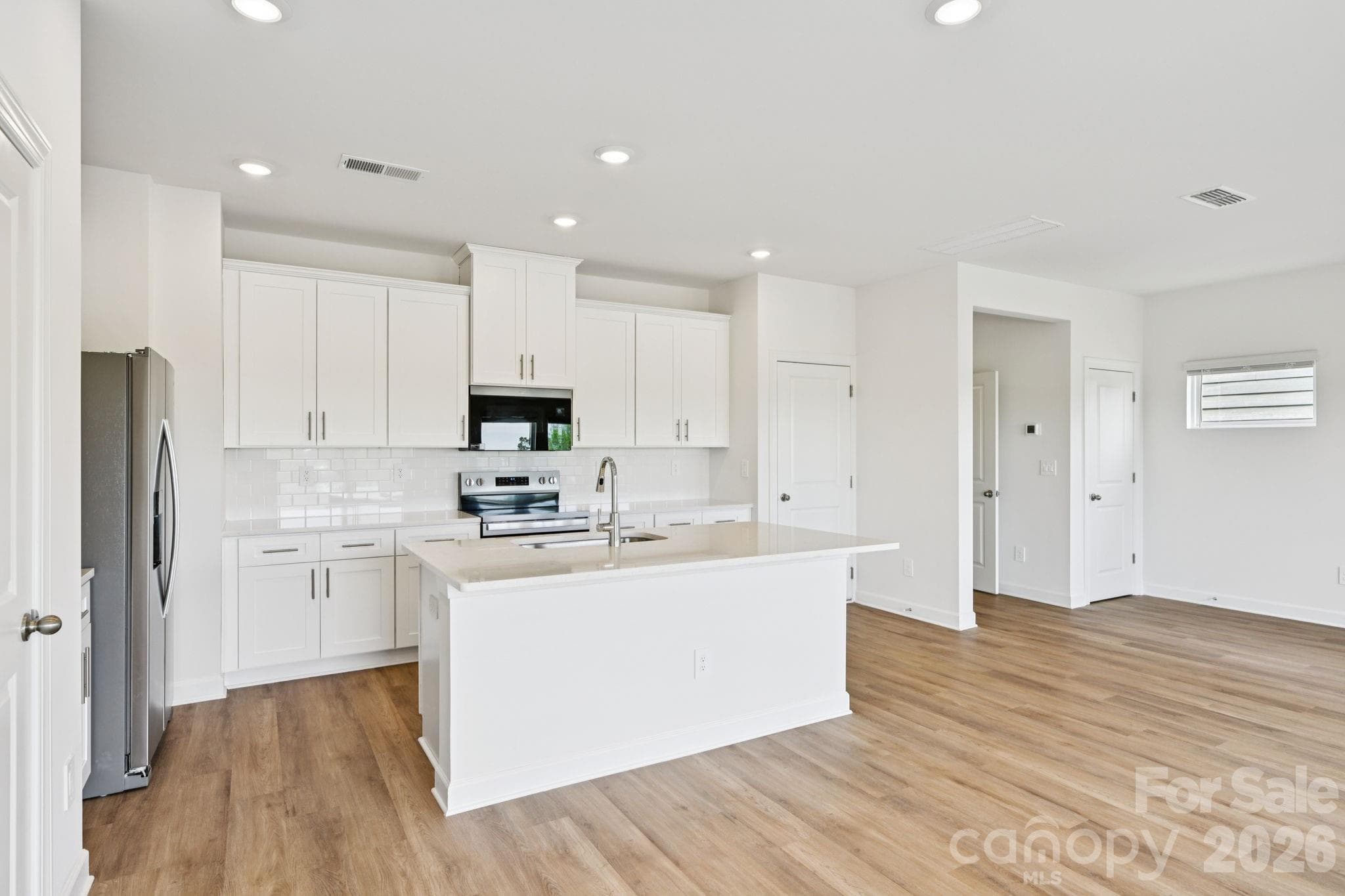 Photo is not of the actual home, but is an inspirational photo of builder’s model home and may depict options, furnishings, and/or decorator features that are not included - 5060 Poplin Valley, Cherryville