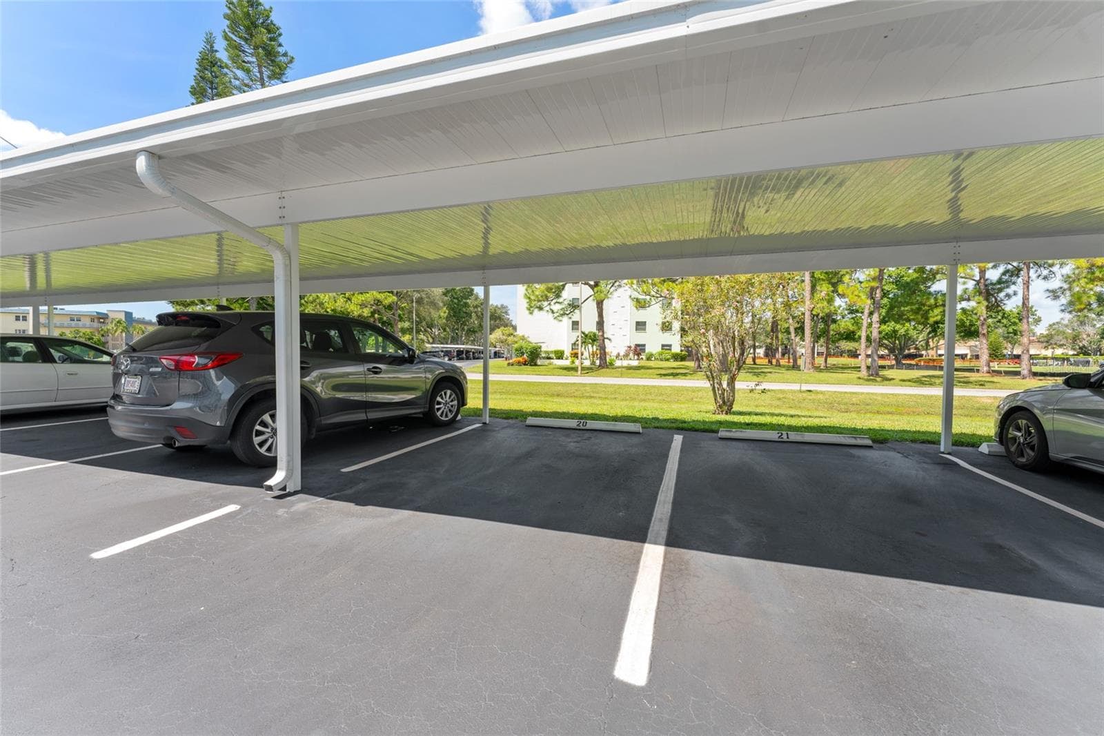 carport #20 is deeded to this unit- it's very close to the elevators! - 5970 80TH ST N #309, ST PETERSBURG