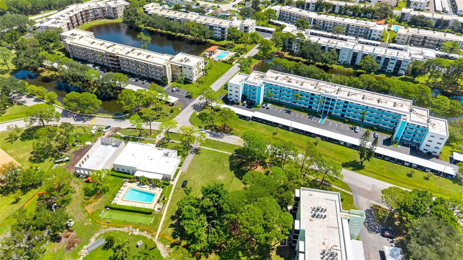 2 of the many pools are close to Lexington-convenient! Also, the new fitness cener is being built directly across the street from this building! - 5970 80TH ST N #309, ST PETERSBURG