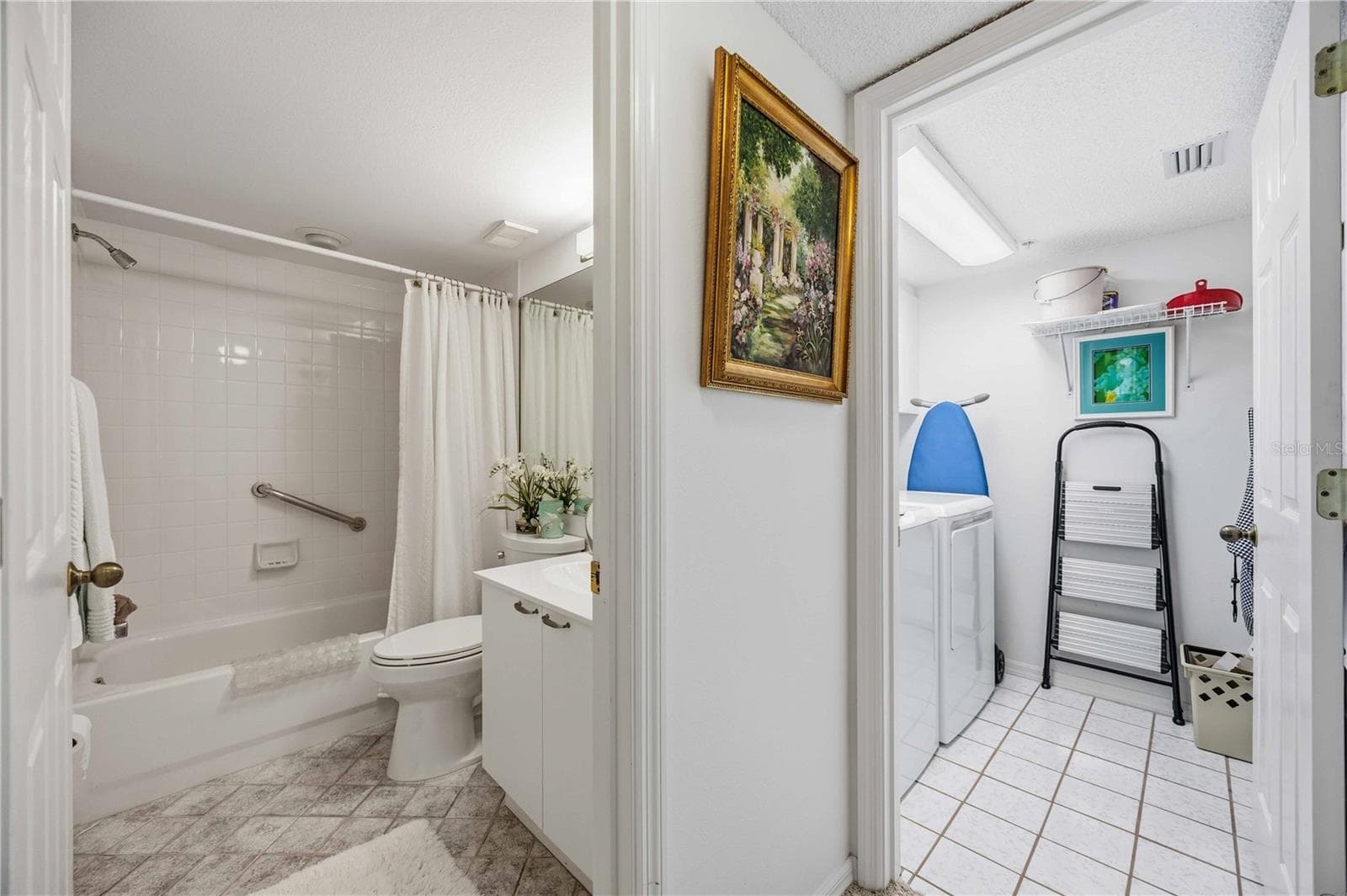 guest bath laundry room - 5627 ASHTON WAY #5627, SARASOTA