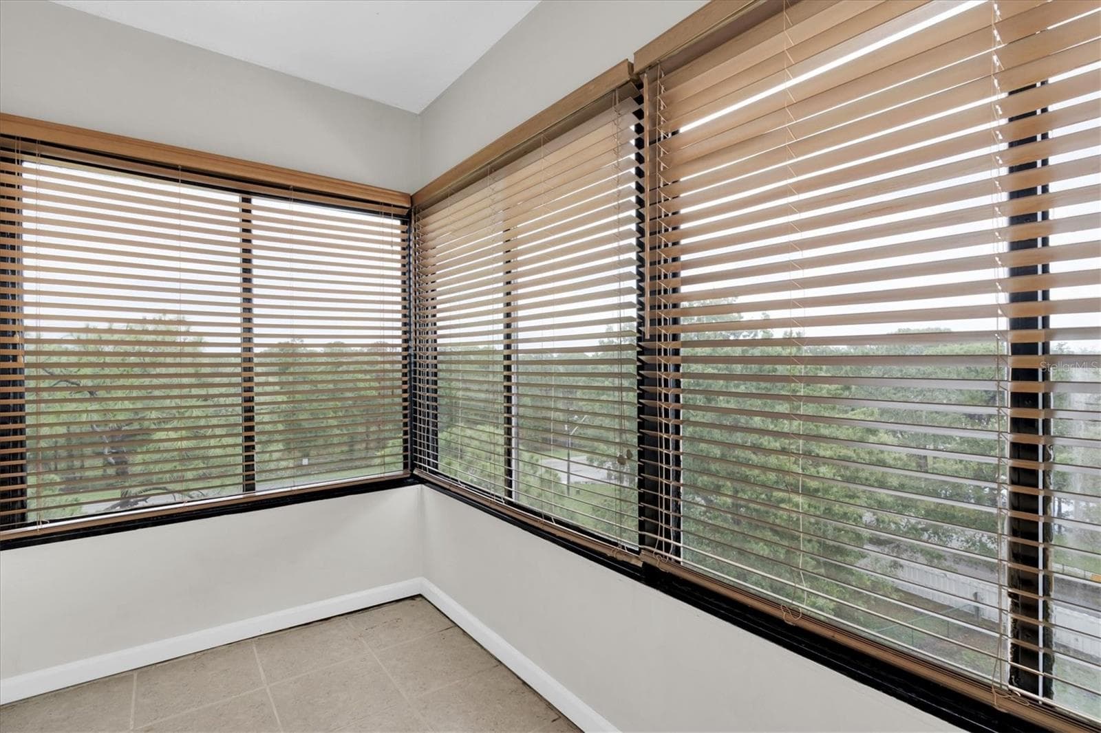 Enclosed patio off of the primary bedroom - 8198 TERRACE GARDEN DR #511, ST PETERSBURG