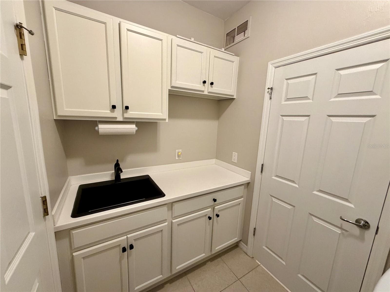 Laundry sink and additional storage - 2436 ARUGULA DR, NORTH PORT