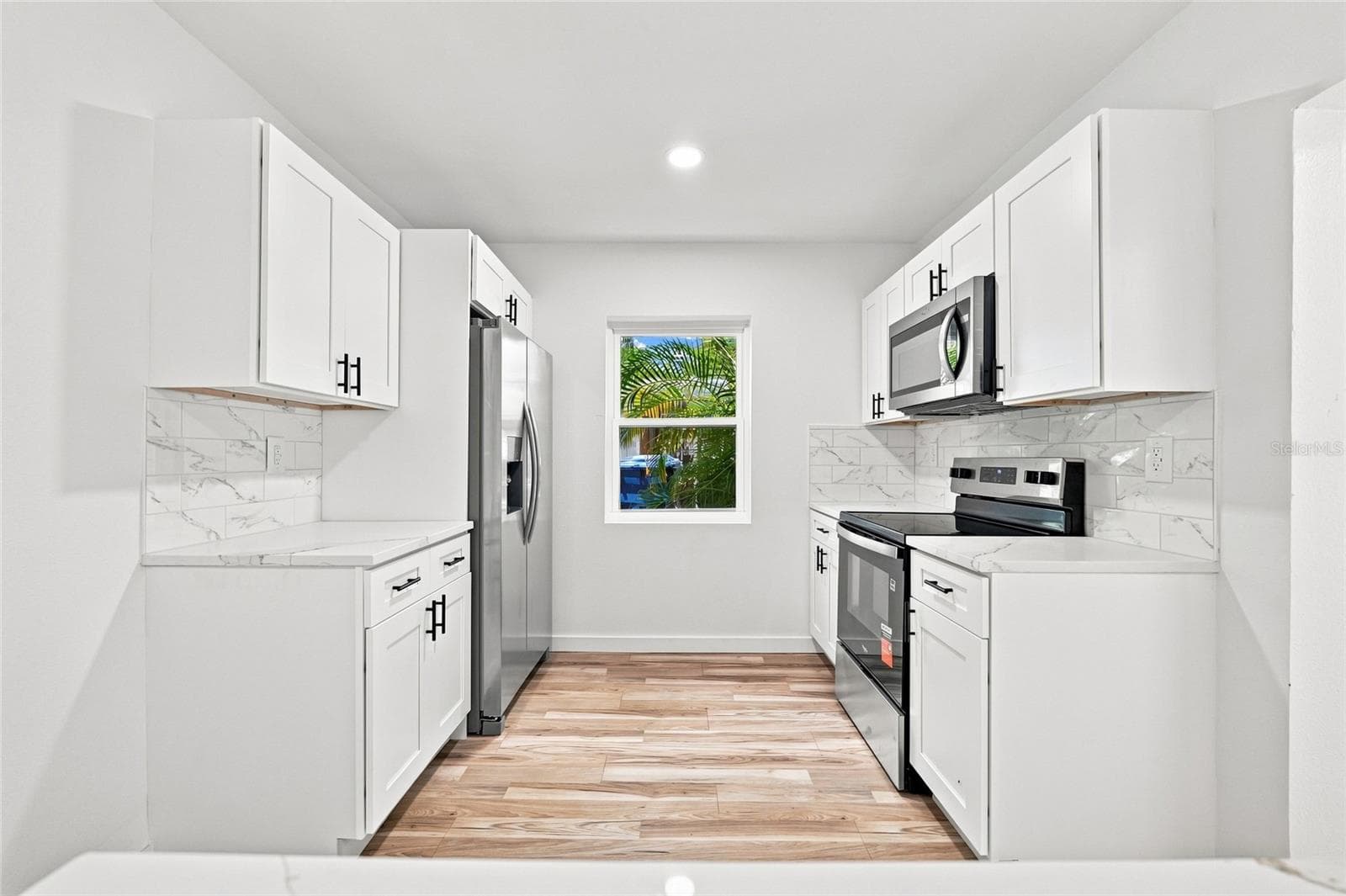 Single Family Residence at 510 3RD AVE NE, LARGO, photo 10 of 33