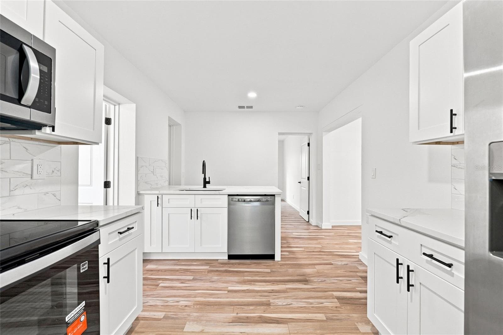Single Family Residence at 510 3RD AVE NE, LARGO, photo 12 of 33