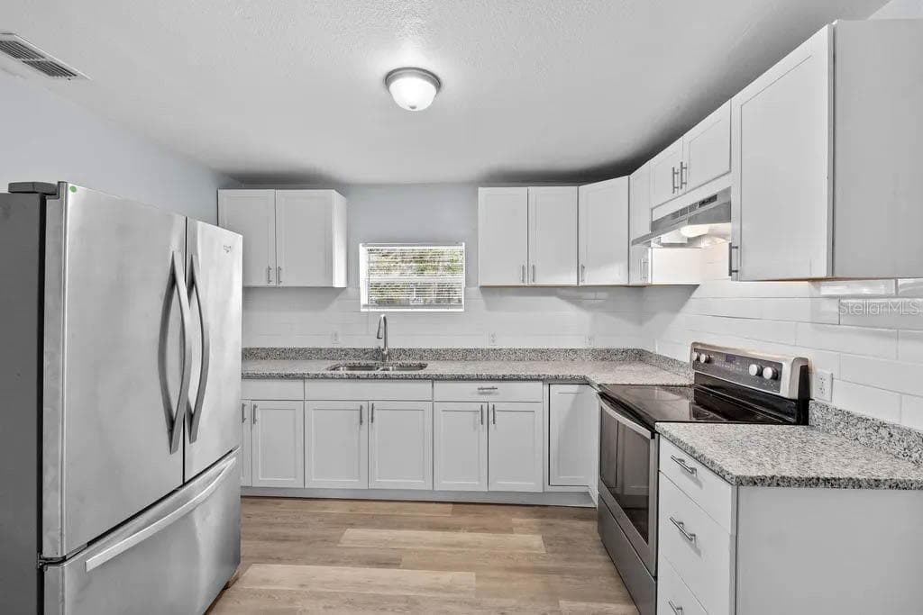 Single Family Residence at 515 S CHARLESTON AVE, FORT MEADE, photo 14 of 30