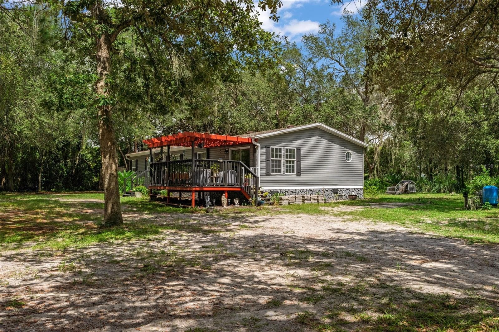 Manufactured Home at 7495 SW 155TH ST, DUNNELLON, photo 4 of 39