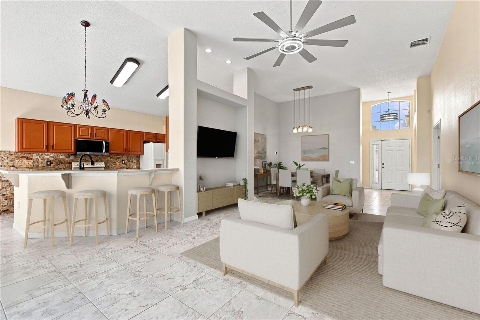 Virtually staged Great Room and Kitchen - 140 MOSS LN, DAVENPORT