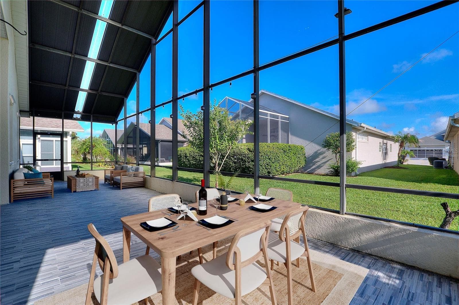 Virtually staged lanai - 140 MOSS LN, DAVENPORT