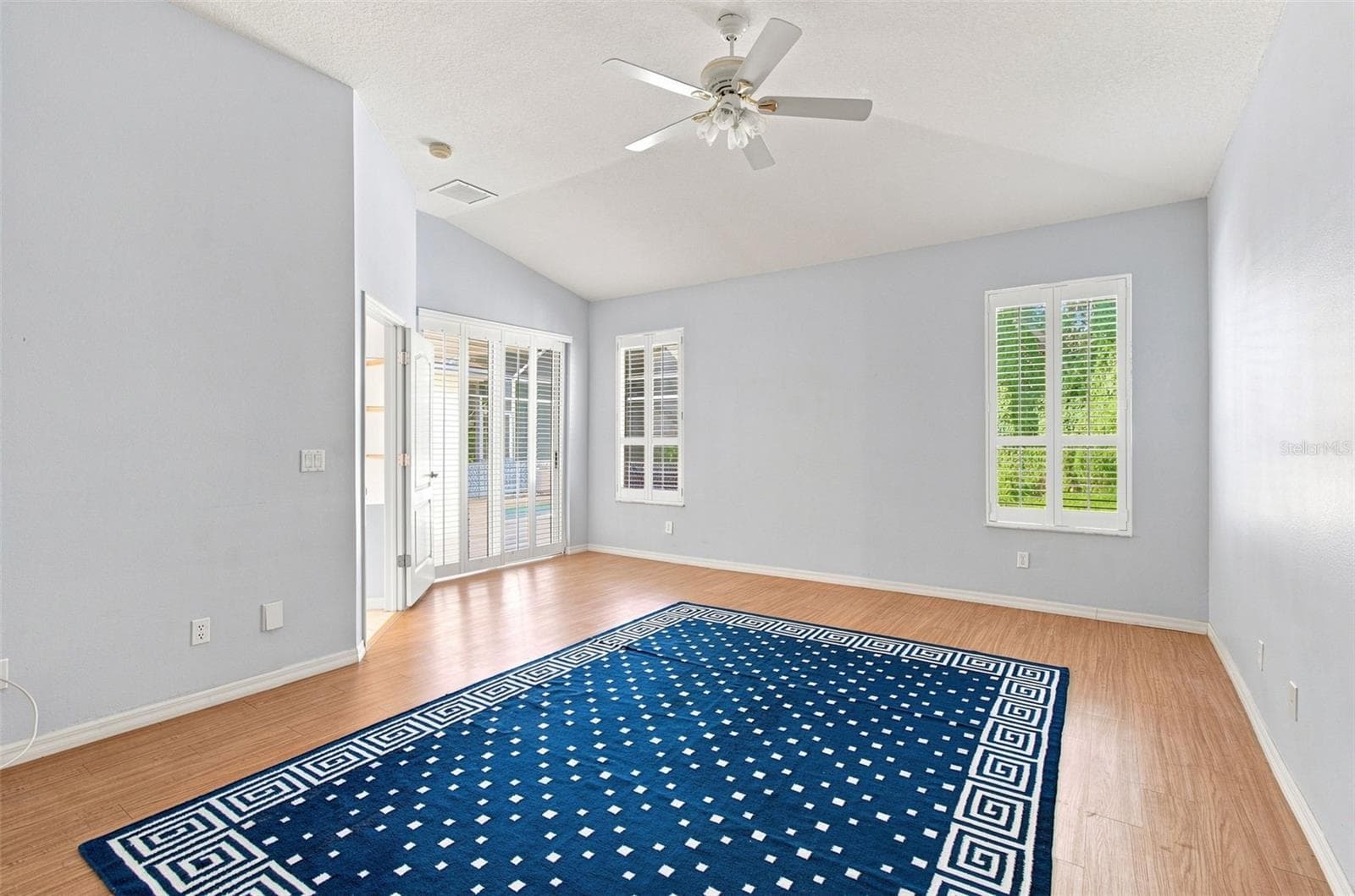 Primary Bedroom, Sliding Doors to Patio - 928 OAKVIEW RD, TARPON SPRINGS