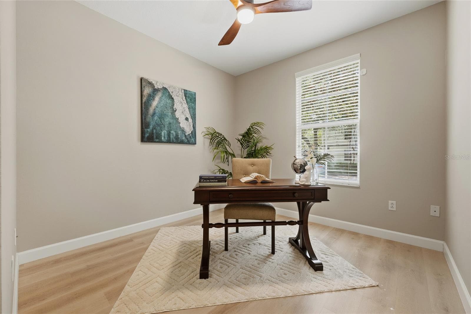 Versatile third bedroom provides an ideal space for guests, a home office or den. - 1674 LAKEMONT AVE #101, ORLANDO