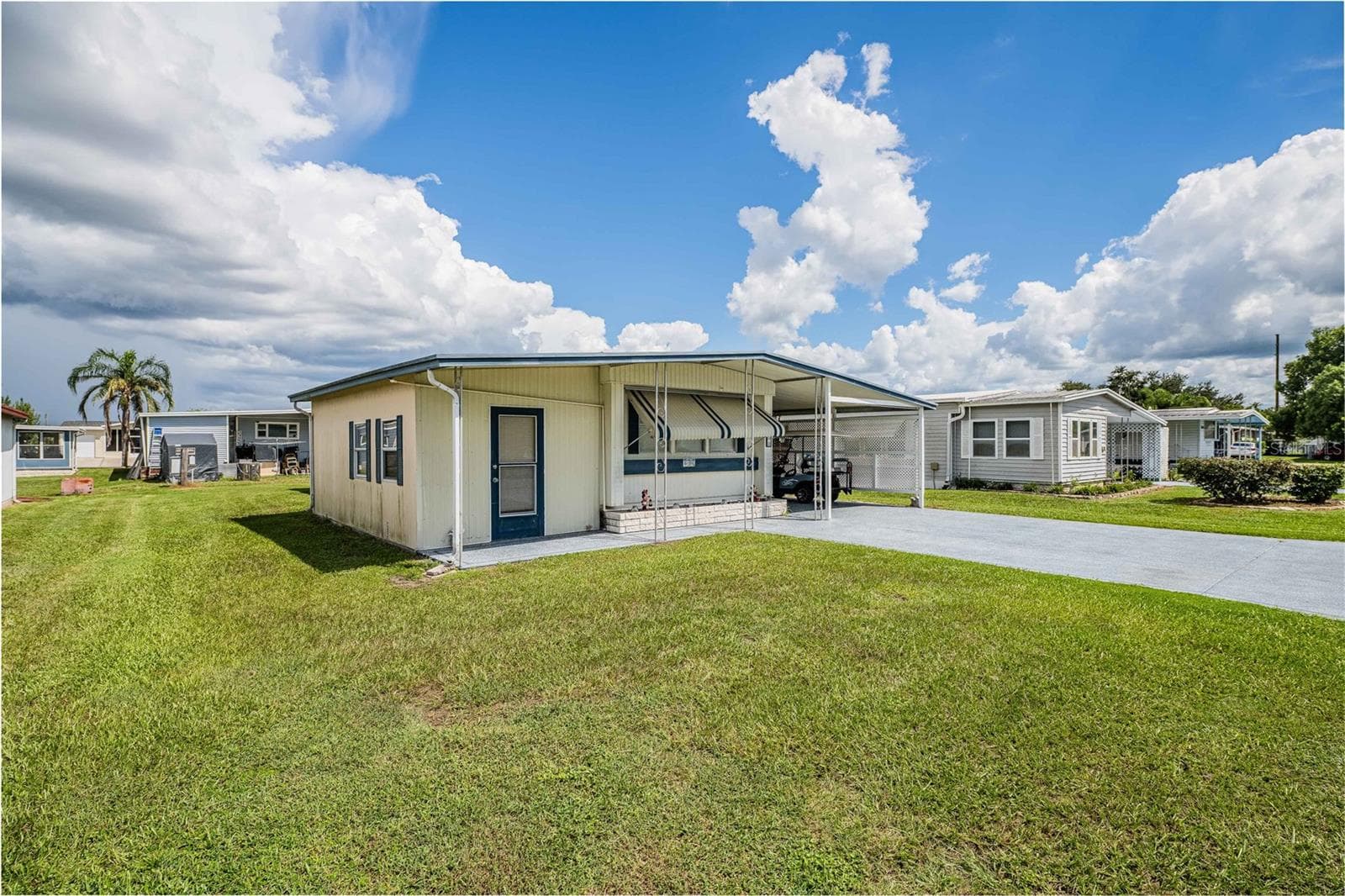 Manufactured Home at 5302 POWHATTAN ST, ZEPHYRHILLS, photo 2 of 50