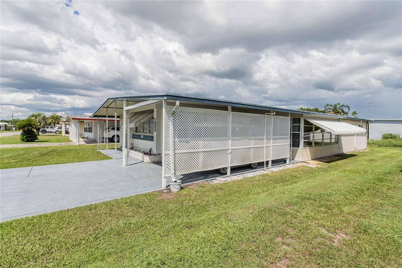 Manufactured Home at 5302 POWHATTAN ST, ZEPHYRHILLS, photo 3 of 50
