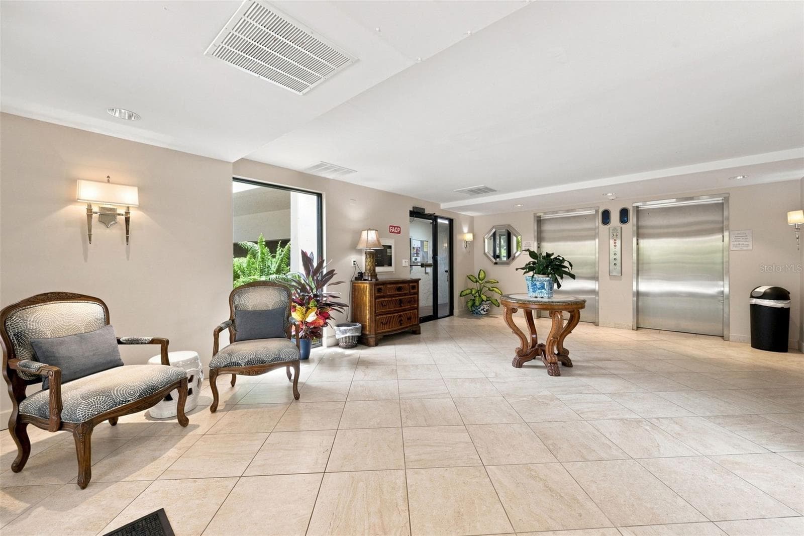 Two elevators to units.  Community mailboxes in lobby. - 55 ROGERS ST #204, CLEARWATER