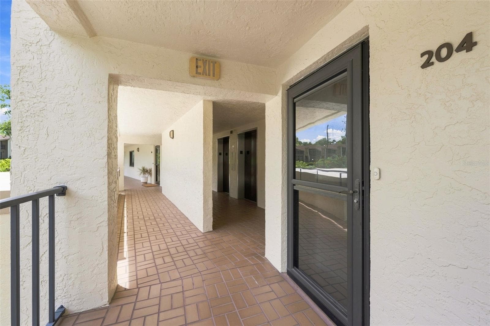 First unit after exiting the elevator - 55 ROGERS ST #204, CLEARWATER