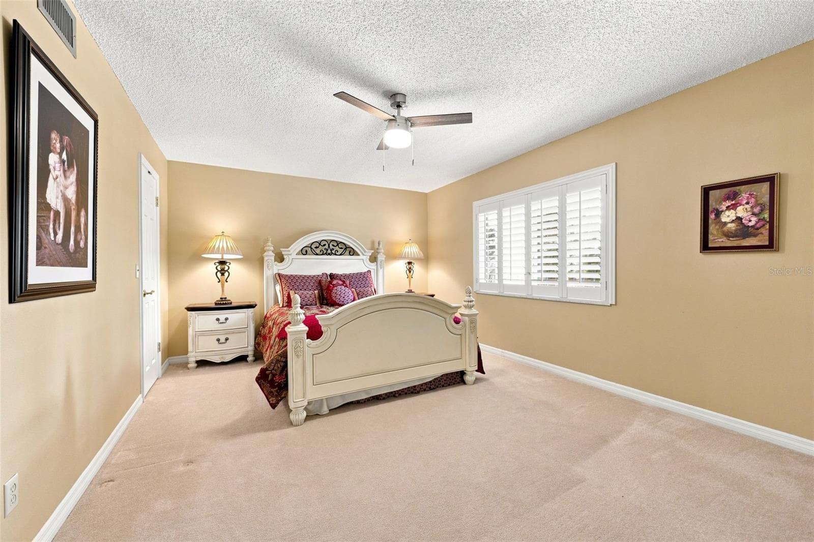 Guest bedroom with walk-in closet - 55 ROGERS ST #204, CLEARWATER