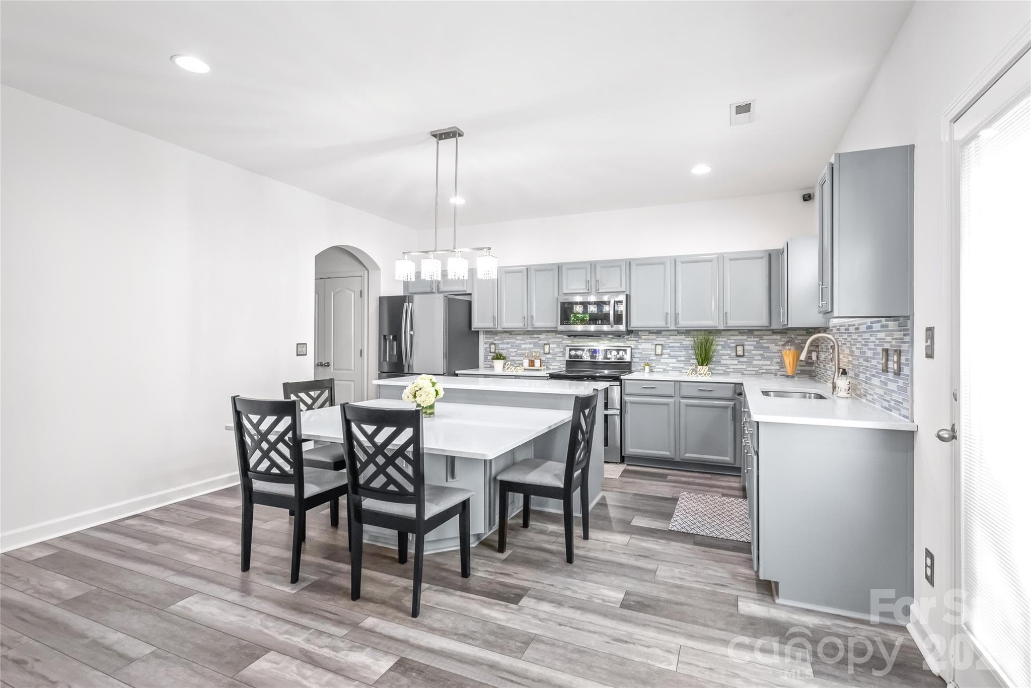 "View of the kitchen from the great room." - 6404 Lanzerac Manor Drive, Charlotte