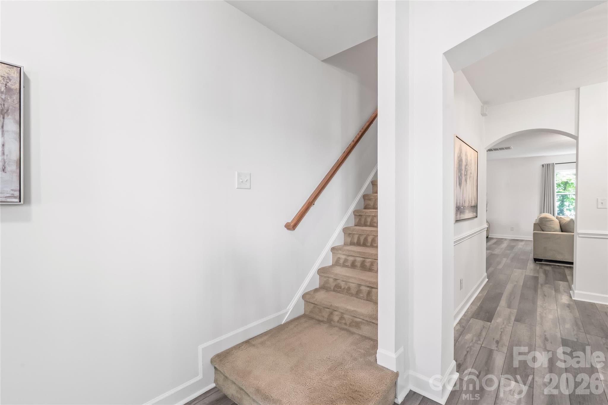"The staircase leading to the second floor, upstairs we go!" - 6404 Lanzerac Manor Drive, Charlotte