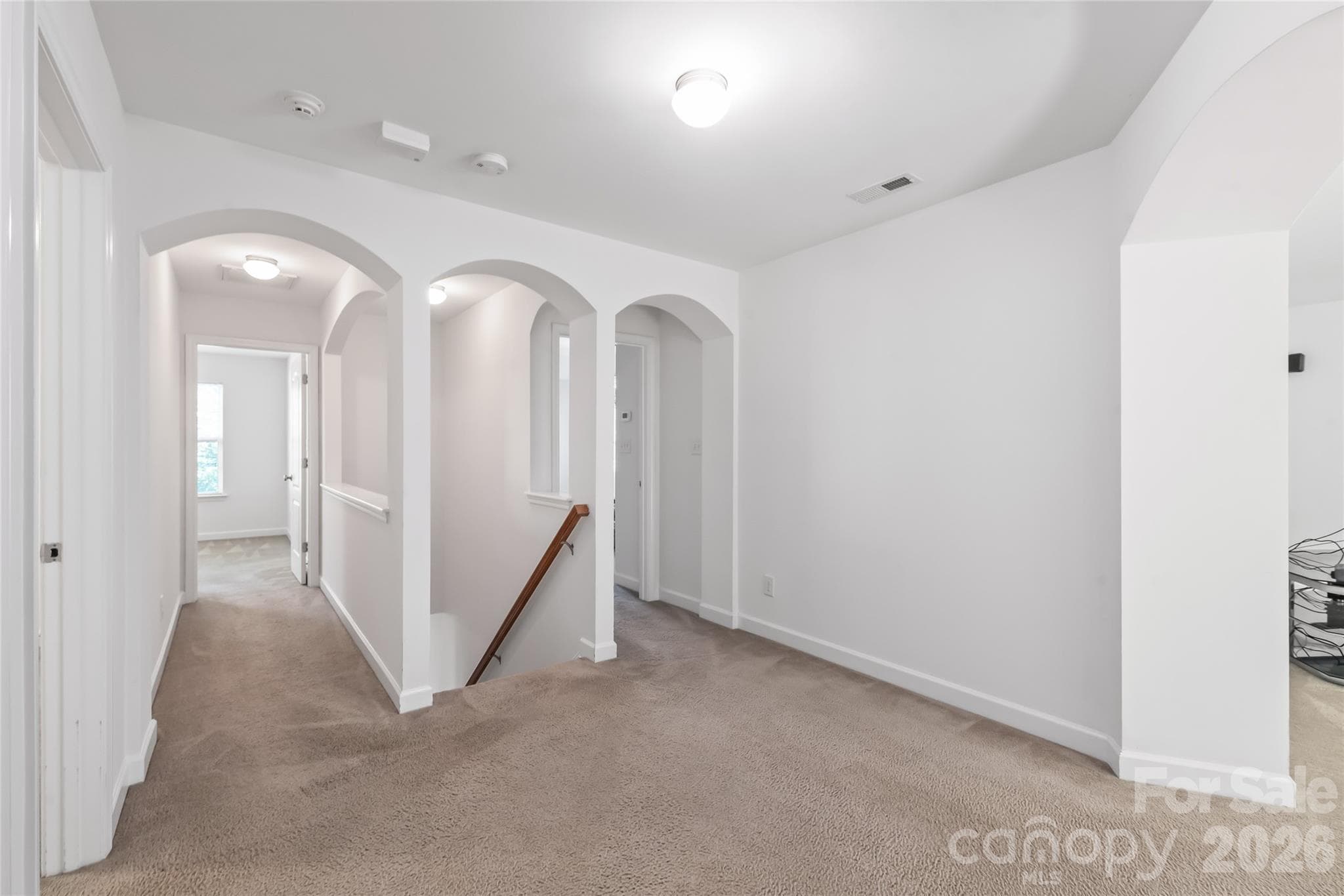 "Spacious open area on the second floor landing." - 6404 Lanzerac Manor Drive, Charlotte