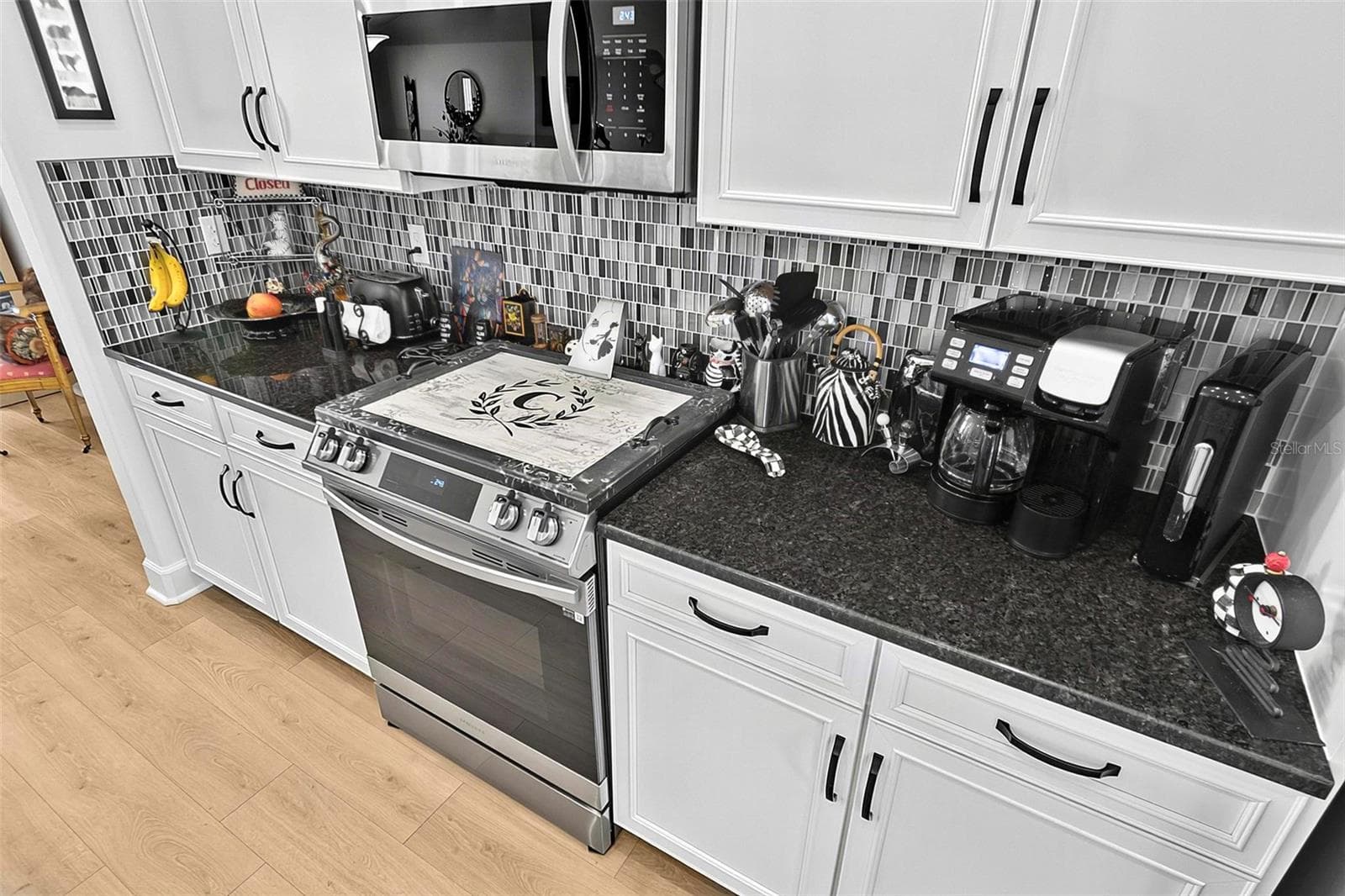 Upgraded stainless steel appliances less than 2 yrs old - 21 WOOD CLIFT LN, PALM COAST