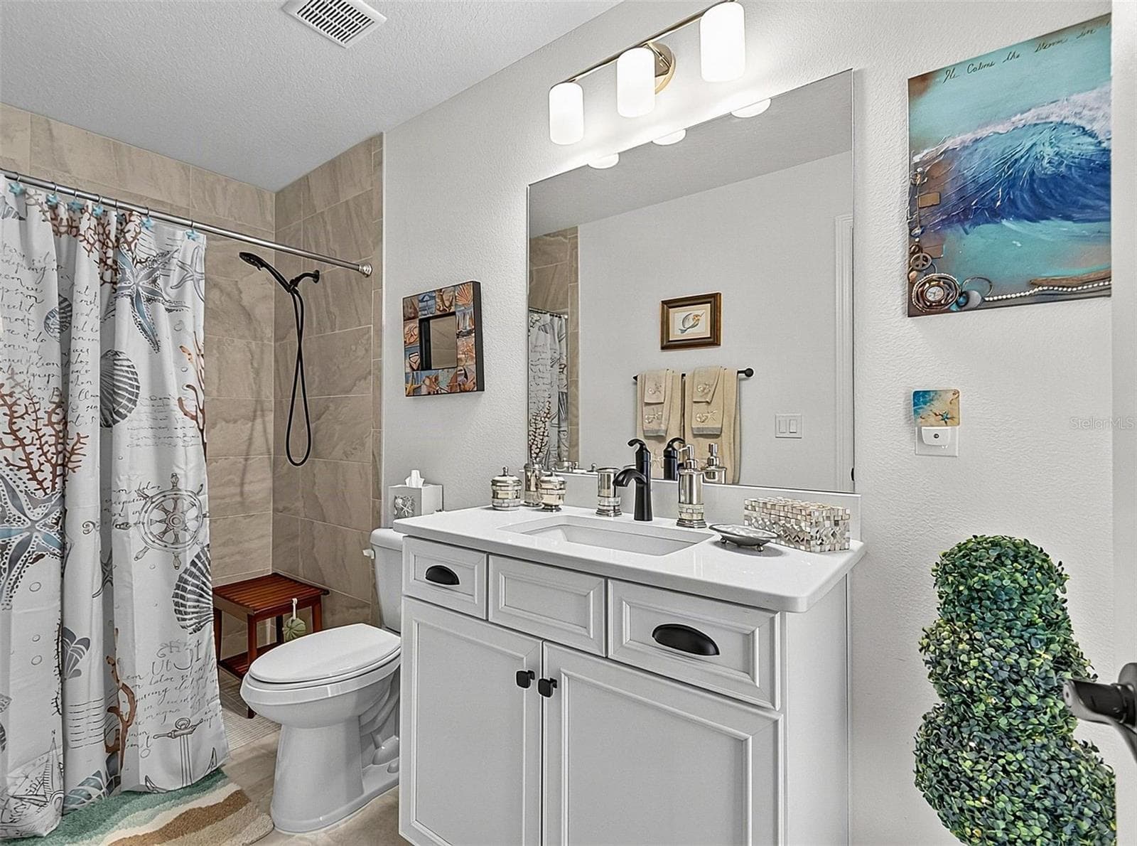 On suite bathroom with walk in shower - 21 WOOD CLIFT LN, PALM COAST