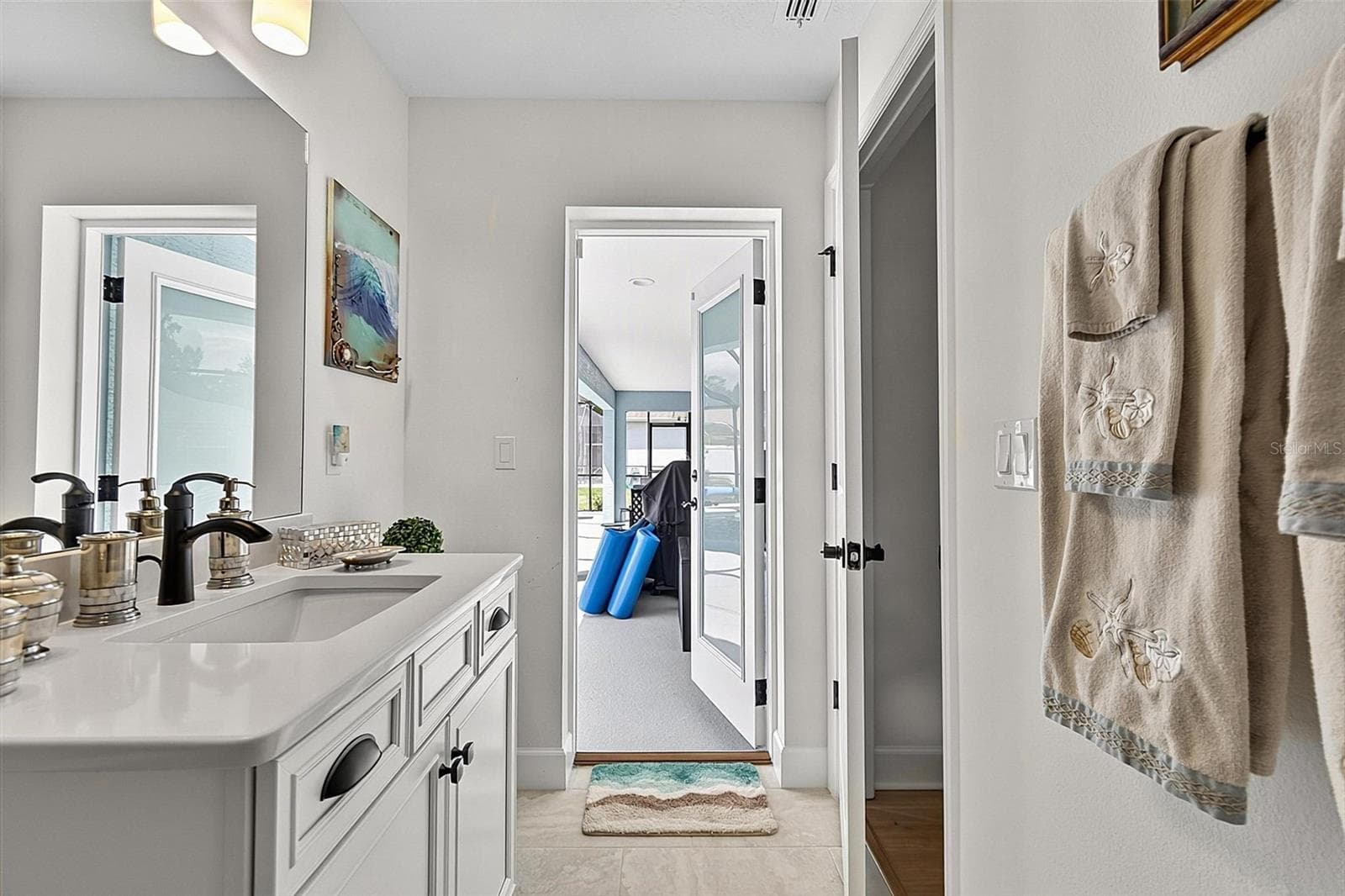 Pool door from 3rd bath - 21 WOOD CLIFT LN, PALM COAST