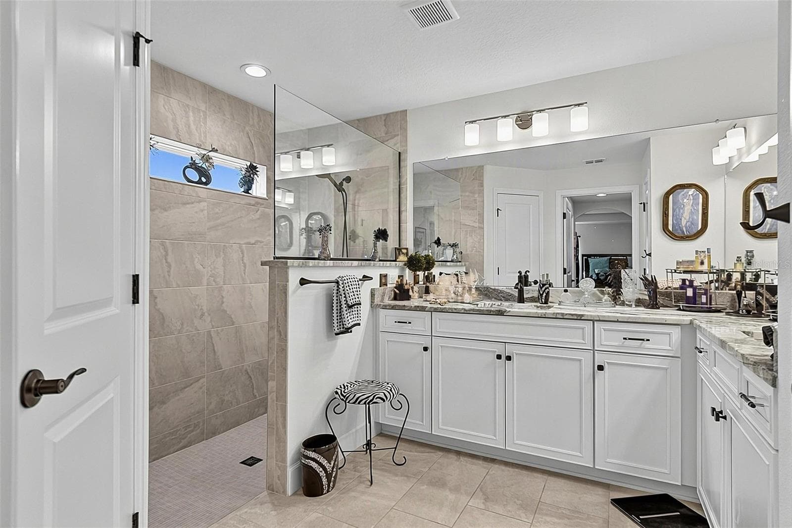 Luxury primary bathroom with large walk in shower - 21 WOOD CLIFT LN, PALM COAST