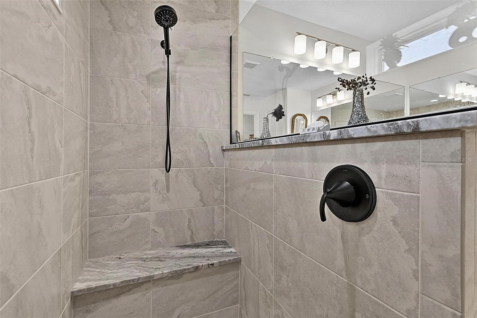 Walk in shower with black matter fixtures - 21 WOOD CLIFT LN, PALM COAST