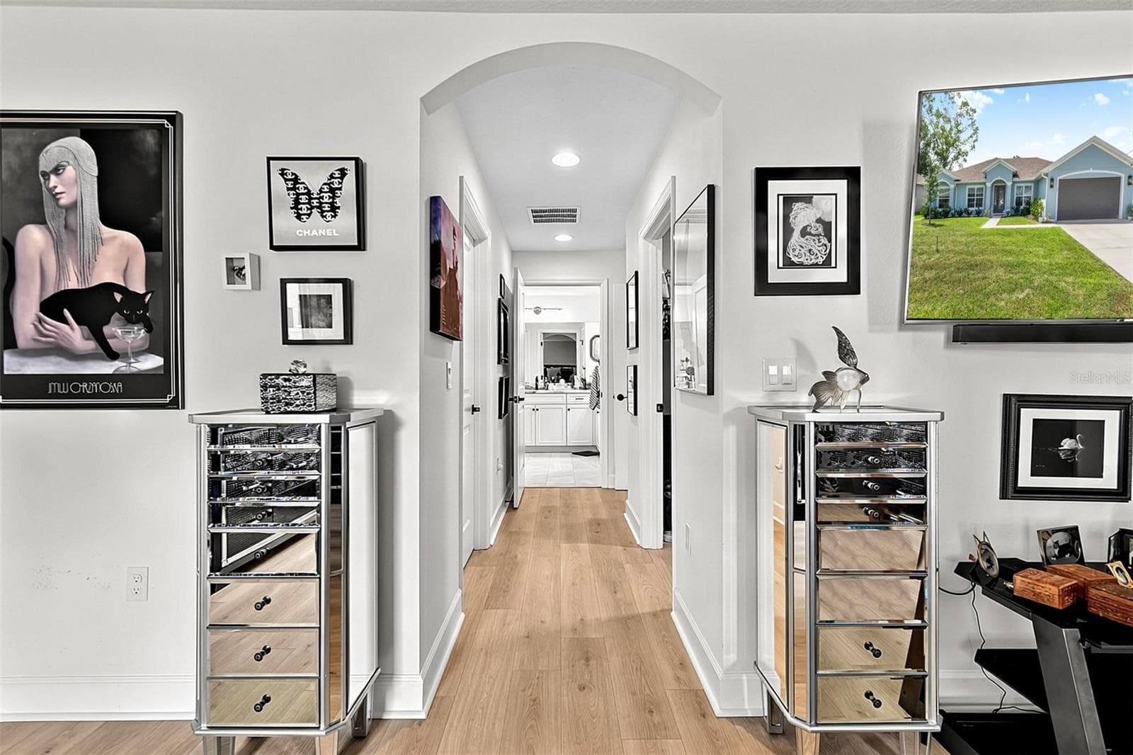 Hall leading to Primary bath and two walk in closets - 21 WOOD CLIFT LN, PALM COAST