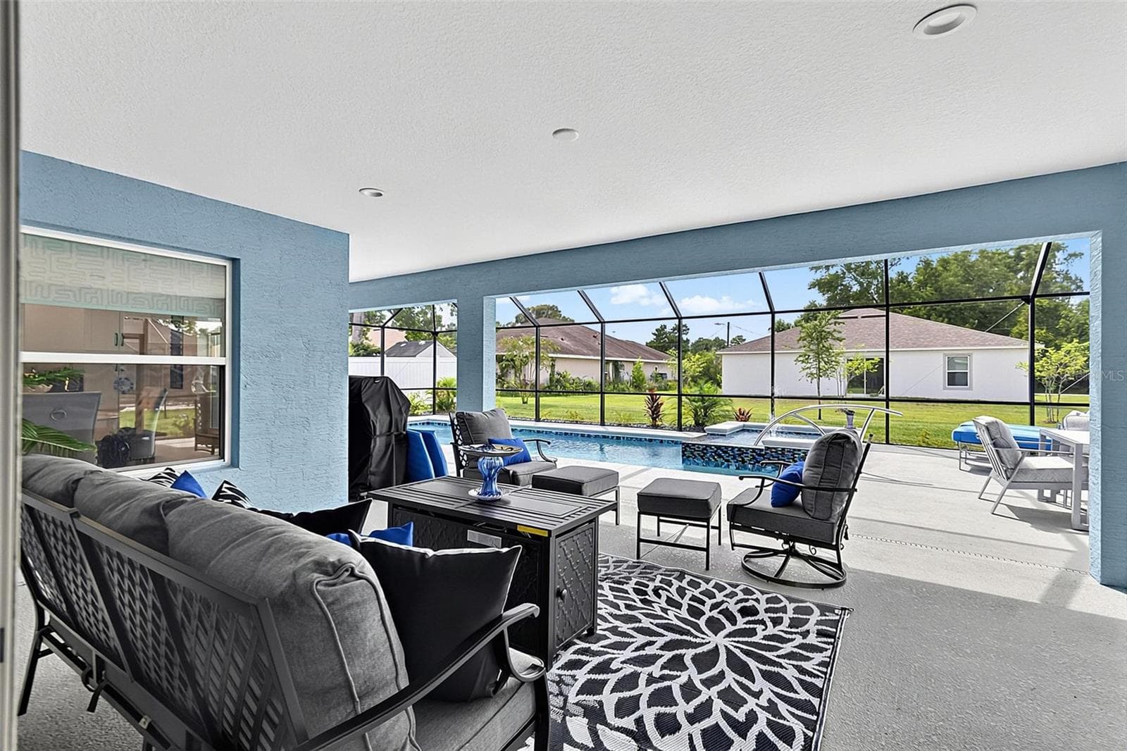 Expansive covered lanai for pool parties - 21 WOOD CLIFT LN, PALM COAST