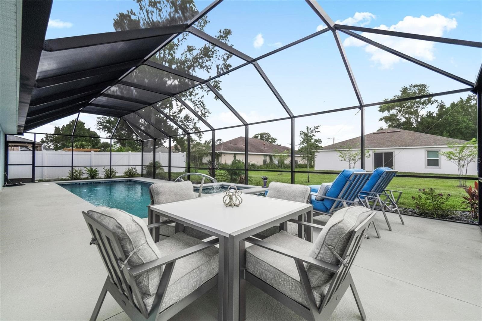 Relax by the gorgeous pool built by Waterside in 2025 - 21 WOOD CLIFT LN, PALM COAST
