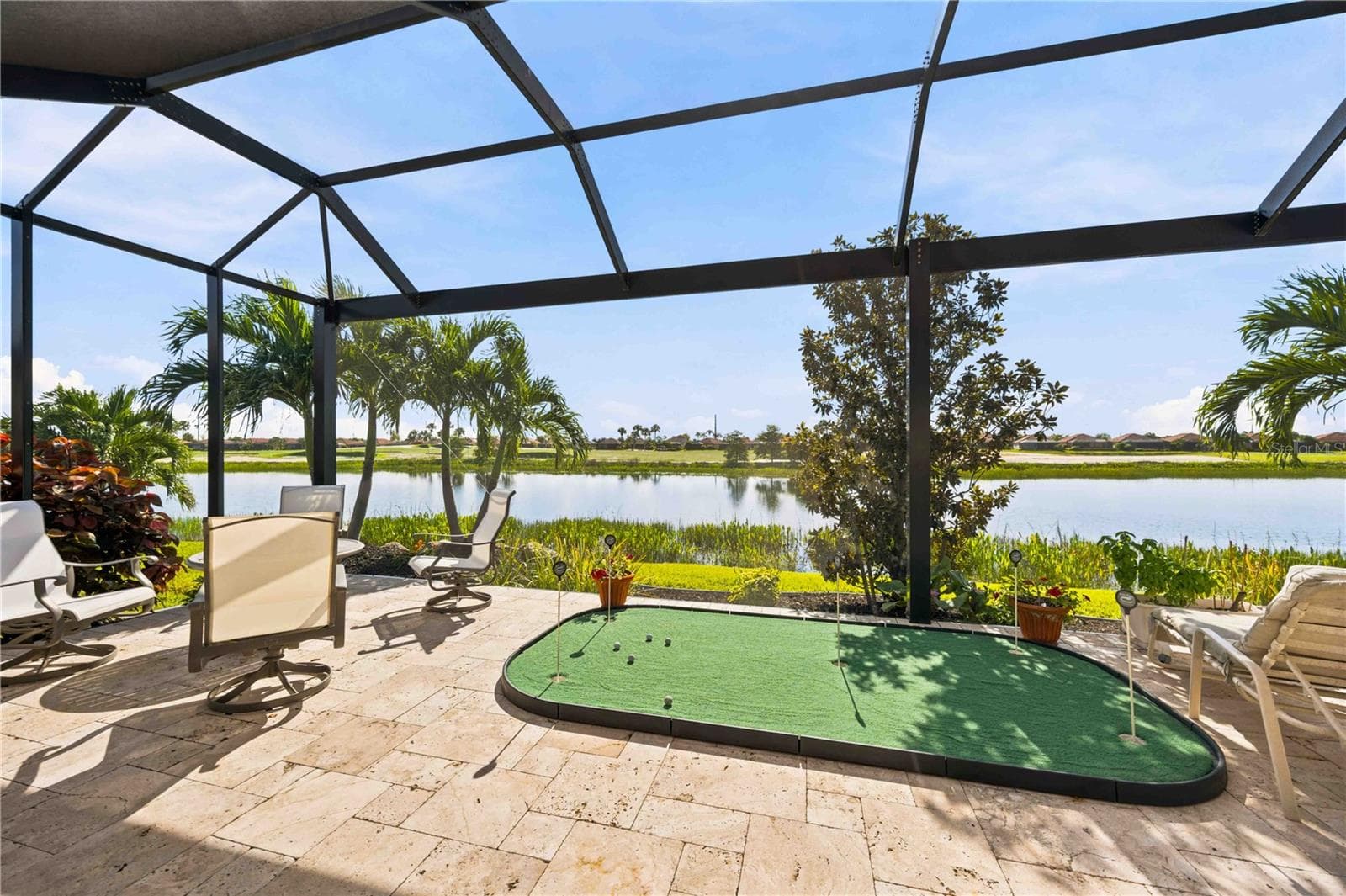 Extended lanai on water with spa and Hurricane Screens. - 23709 WAVERLY CIR, VENICE