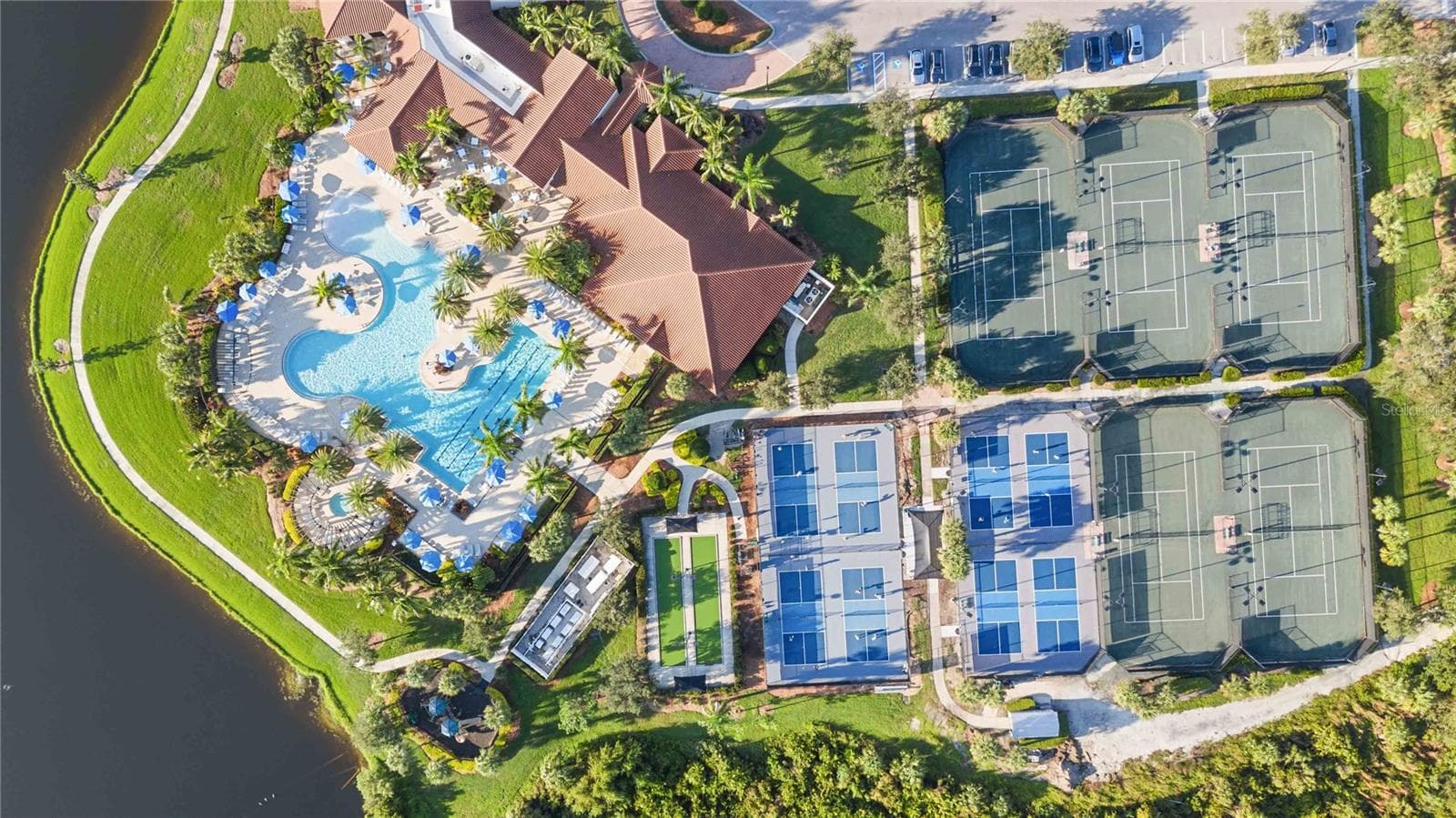 A great aerial of the courts for tennis, pickleball, bocce and the pool/fitness areas. - 23709 WAVERLY CIR, VENICE