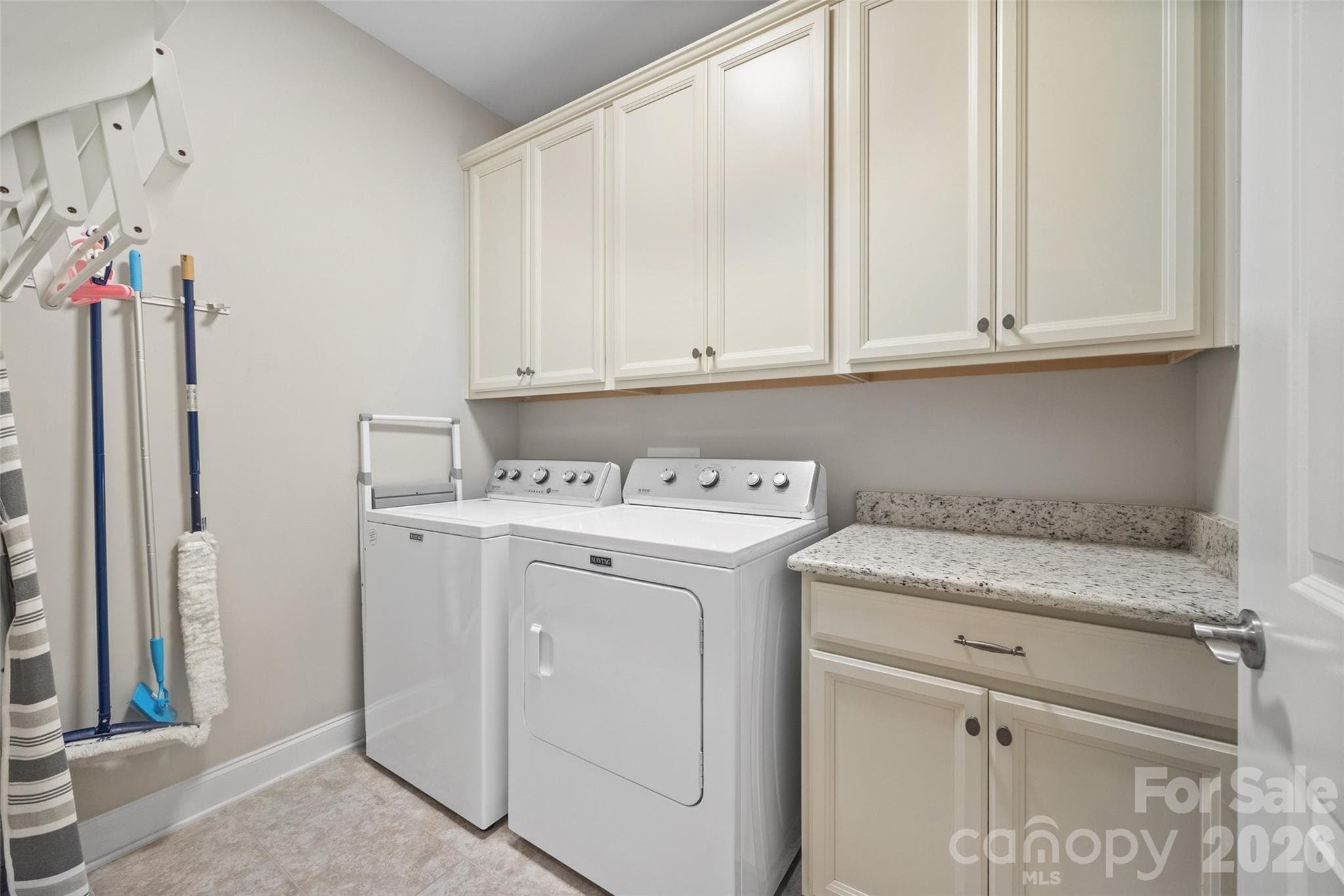 Laundry room with cabinetry - 420 Trillium Way, Belmont