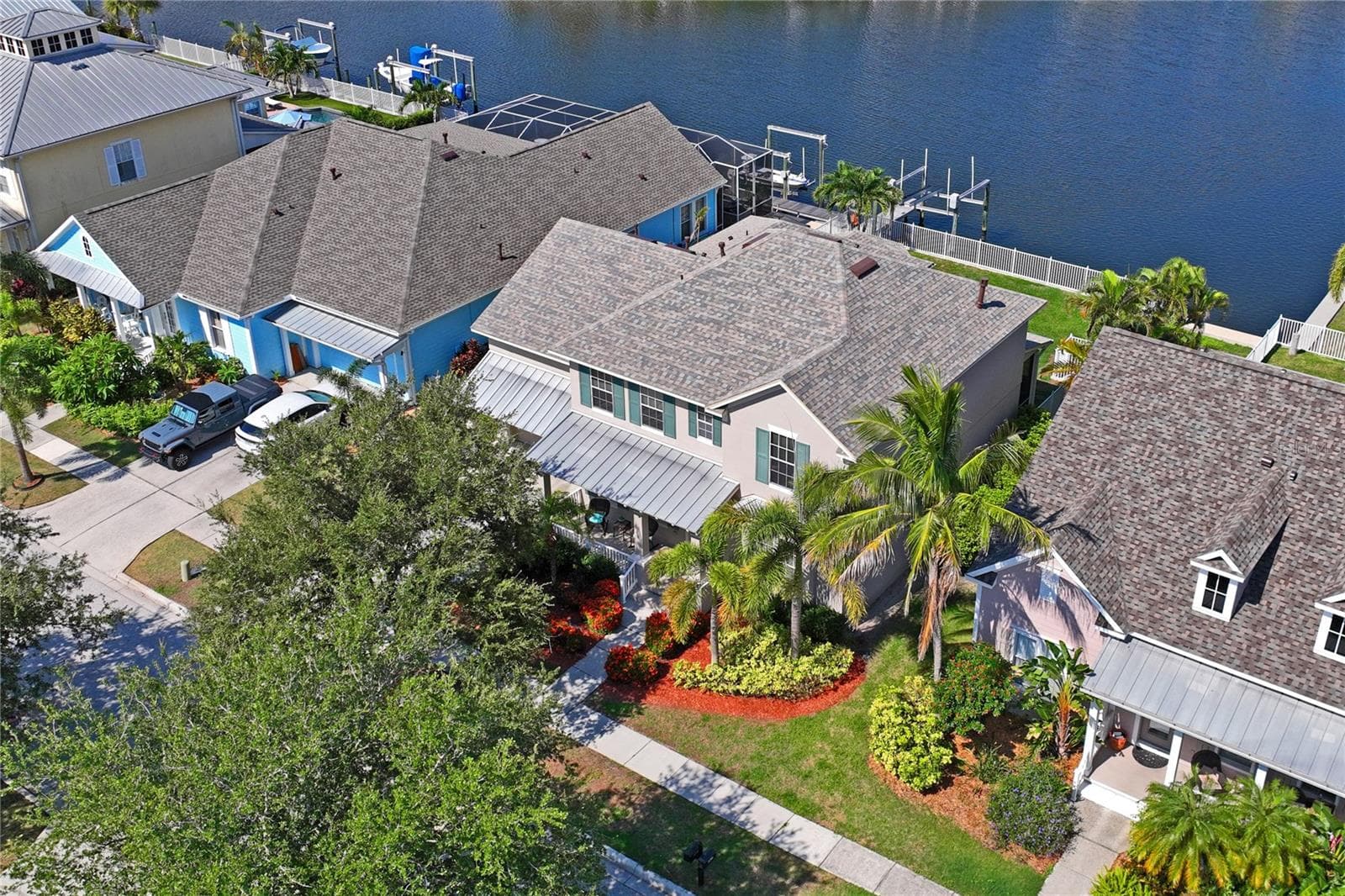 Exterior Waterfront Home Backyard Facing West - 5714 SEA TROUT PL, APOLLO BEACH