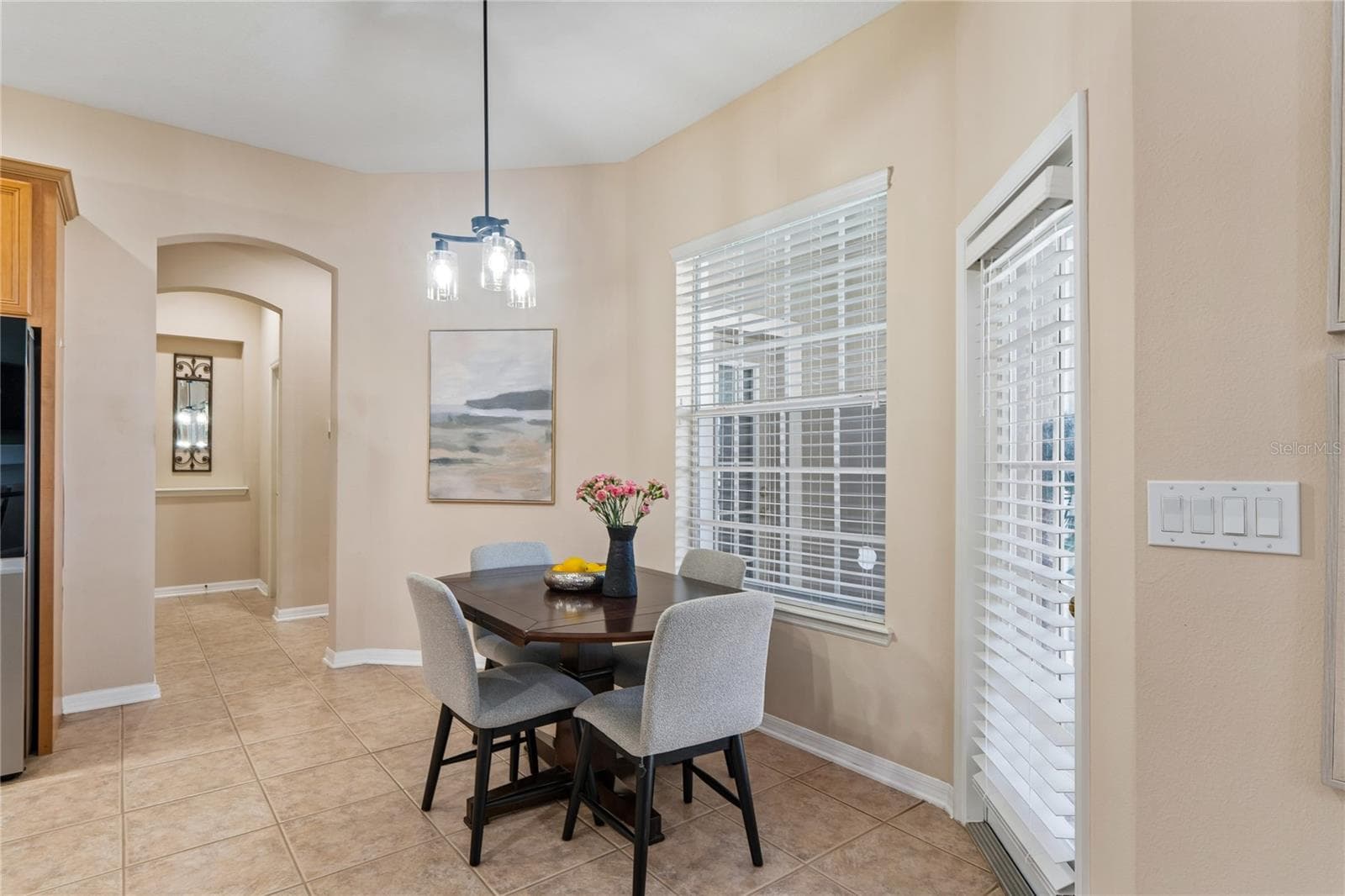 Kitchenette hallway to Garage and Inside Laundry room - 5714 SEA TROUT PL, APOLLO BEACH