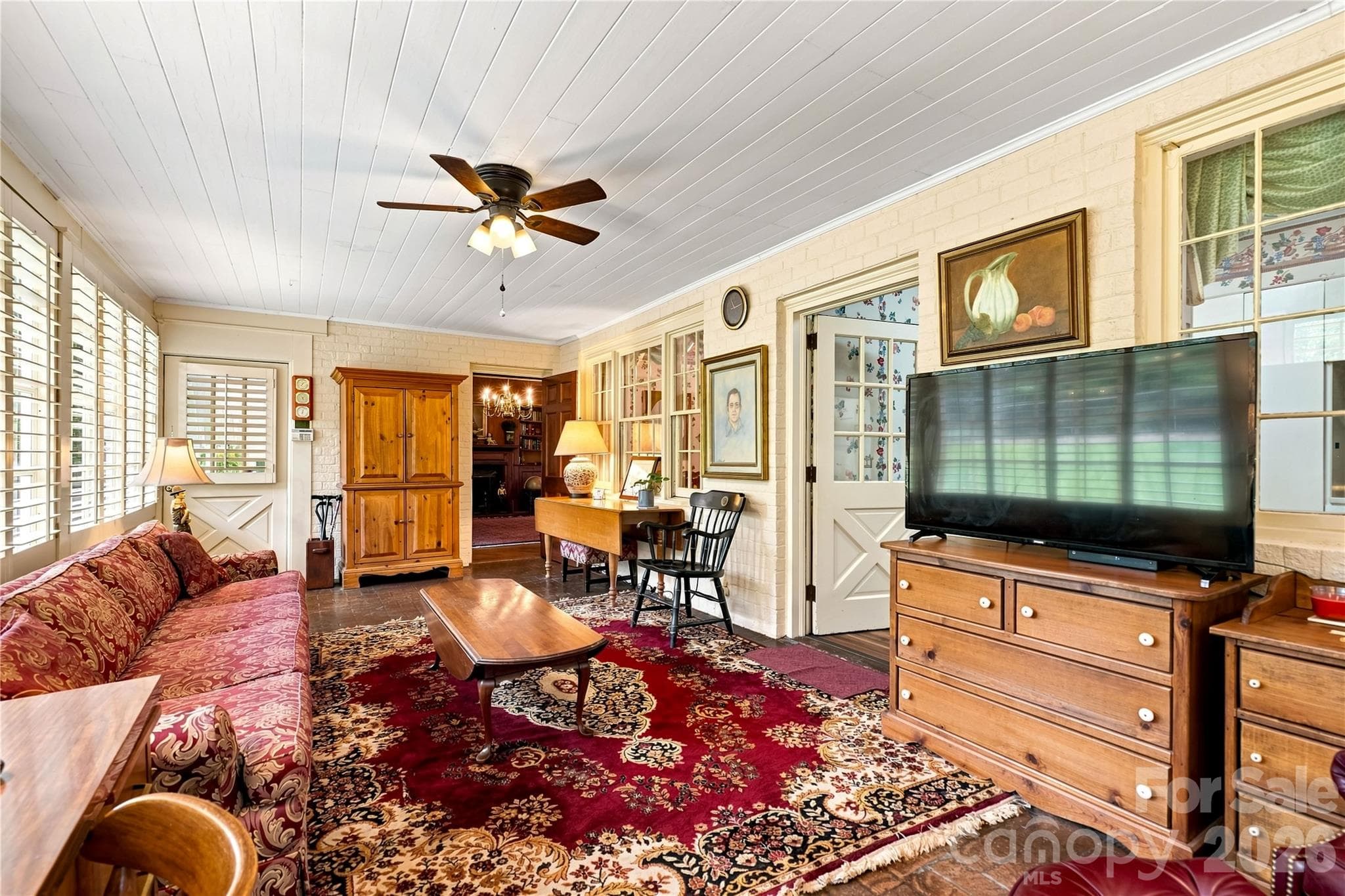 Additional sunroom view with access to the outdoor living areas. - 209 Labans Lane, Lincolnton