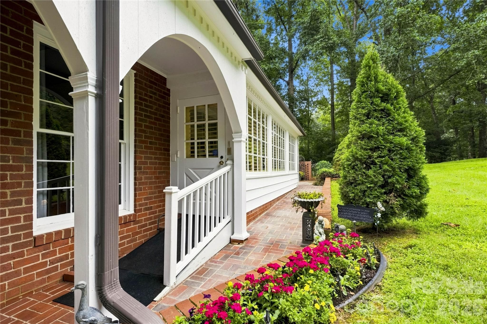 Covered back entry with traditional brick and architectural details. - 209 Labans Lane, Lincolnton