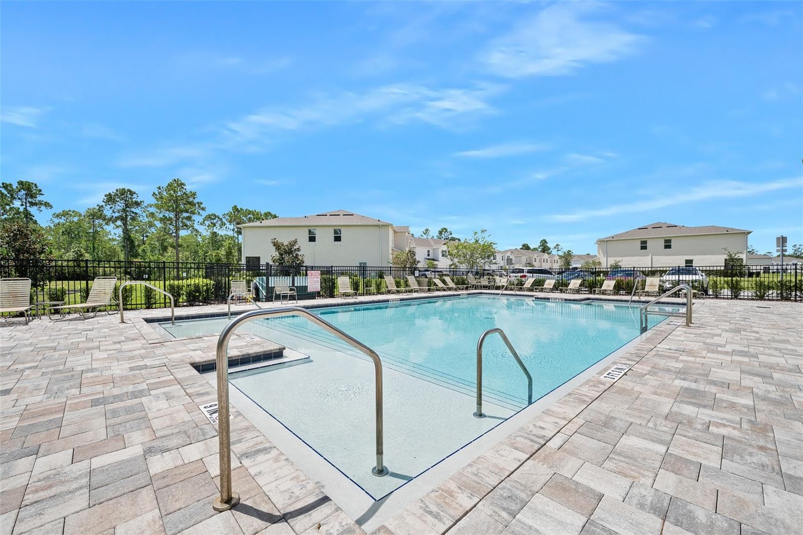 Shallow end with handrails - 166 REENA DR, DAYTONA BEACH
