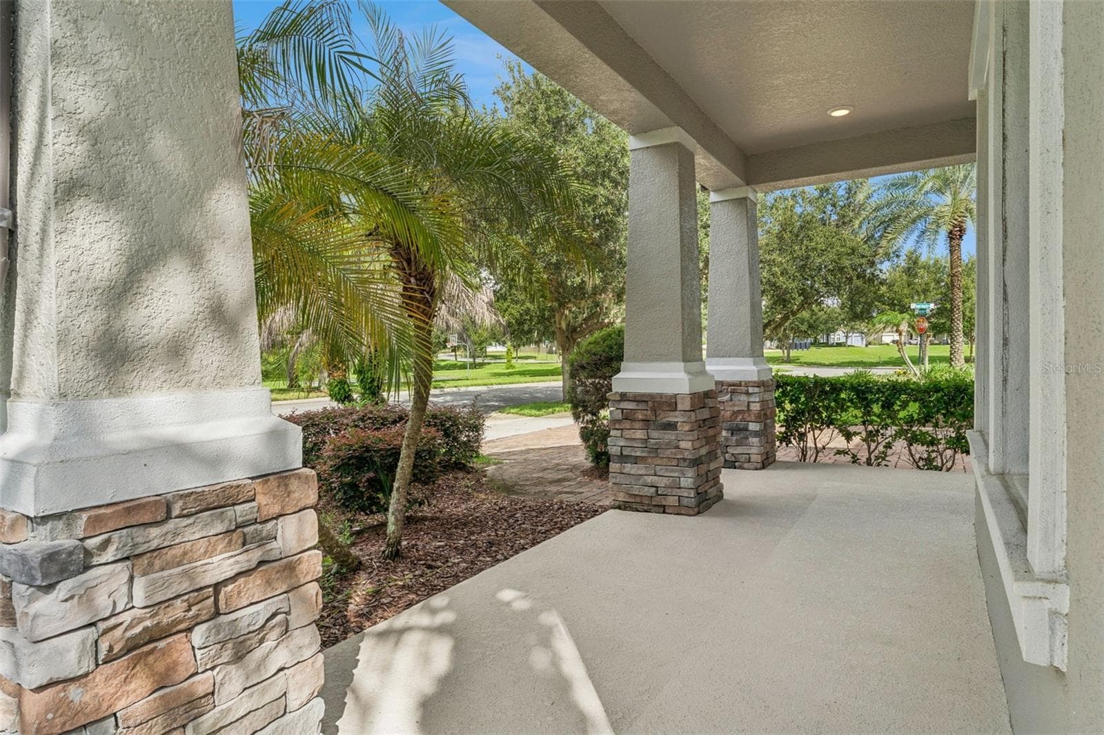 covered front porch - 8001 POND APPLE DR, WINTER GARDEN
