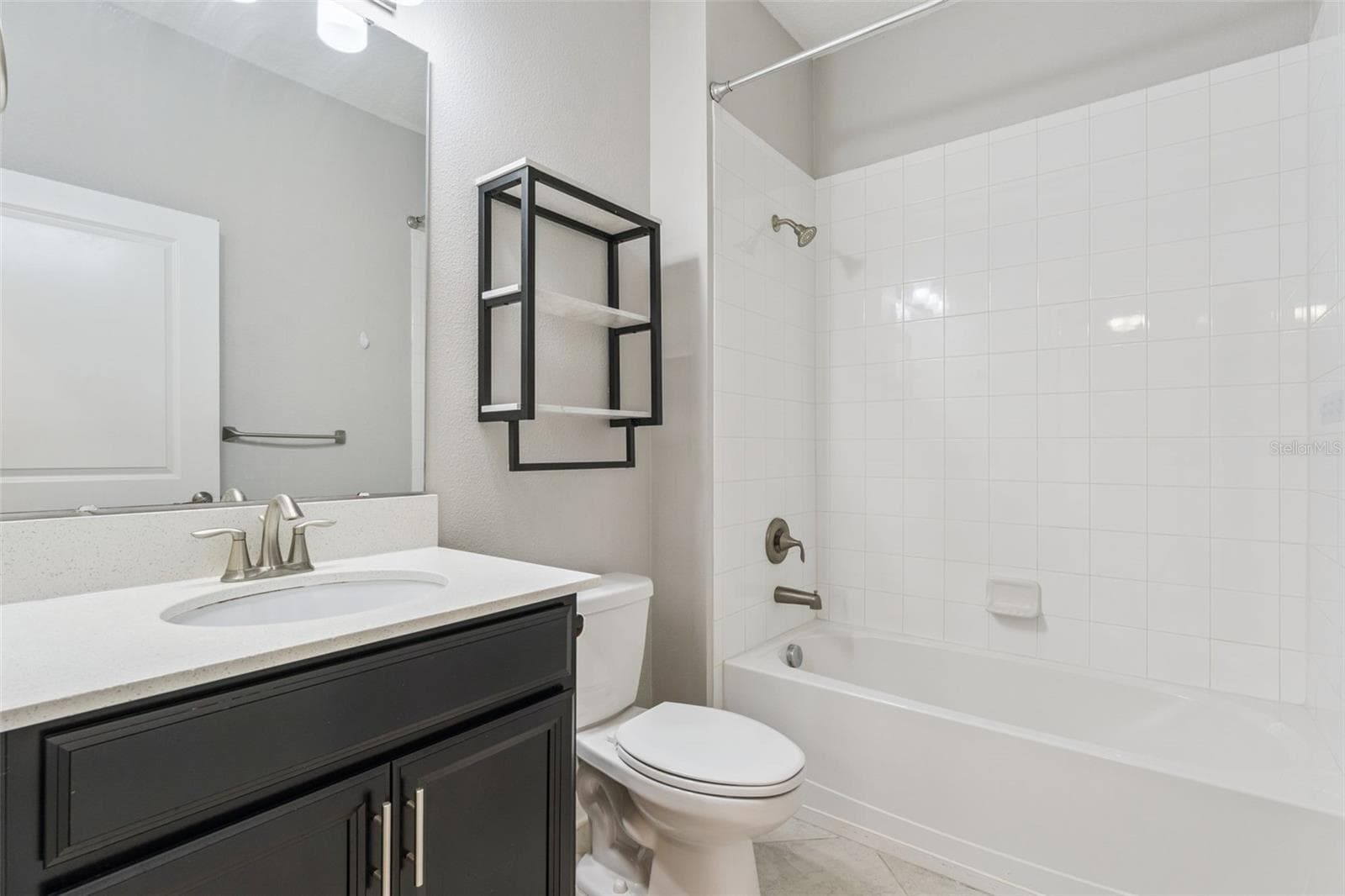 downstairs full bath - 8001 POND APPLE DR, WINTER GARDEN