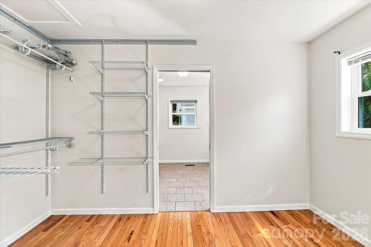 Primary bedroom walk in closet - 2 Elkmont Place, Asheville