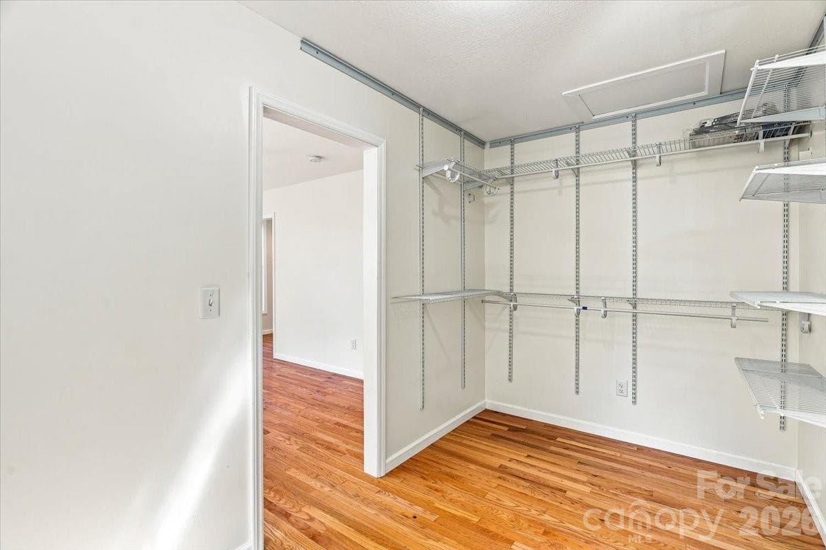 Primary bedroom walk in closet - 2 Elkmont Place, Asheville