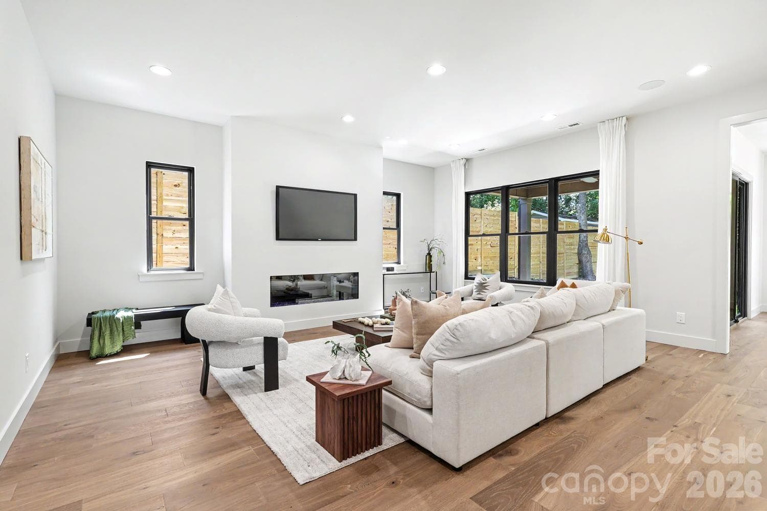 Living Space with 60” linear natural-gas fireplace - Charlotte