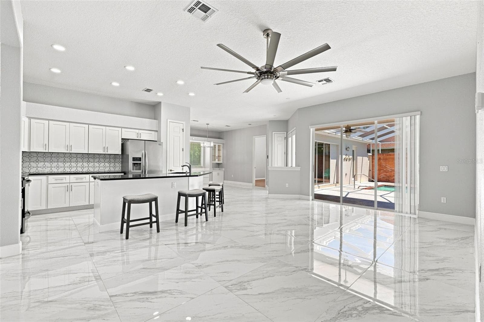 Living Room/Kitchen - 5333 LEATHER SADDLE LN, SPRING HILL