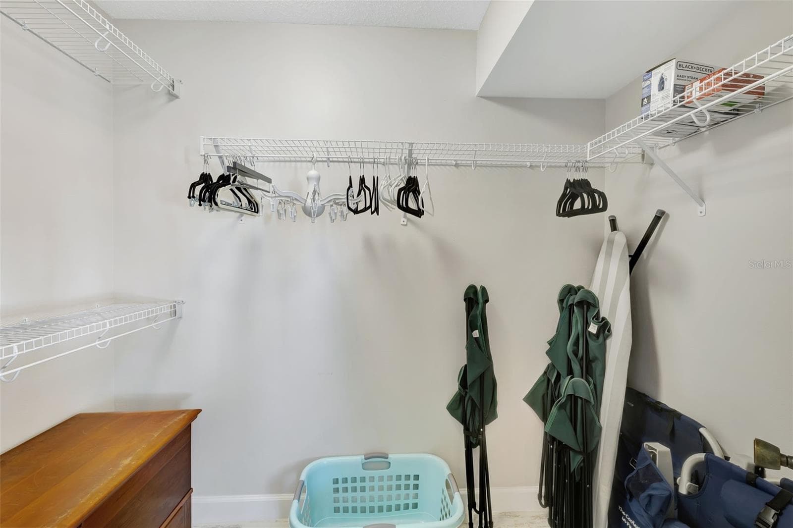 Walk in Closet in the Primary Bedroom - 1130 W PEPPERTREE LN #118, SARASOTA